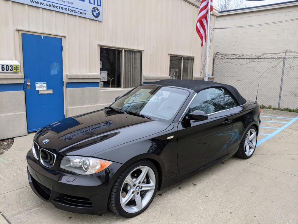 2008 Black BMW 1-Series 135i Convertible (WBAUN93538V) with an 3.0L L6 DOHC 24V engine, Automatic transmission, located at 603 Amelia Street, Plymouth, MI, 48170, (734) 459-5520, 42.378841, -83.464546 - Photo #1