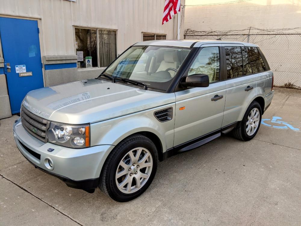 2007 Giverny Green Metallic /Ivory Leather Land Rover Range Rover Sport HSE (SALSK25487A) with an 4.4L V8 DOHC 32V engine, 6-Speed Automatic Overdrive transmission, located at 603 Amelia Street, Plymouth, MI, 48170, (734) 459-5520, 42.378841, -83.464546 - Photo #0