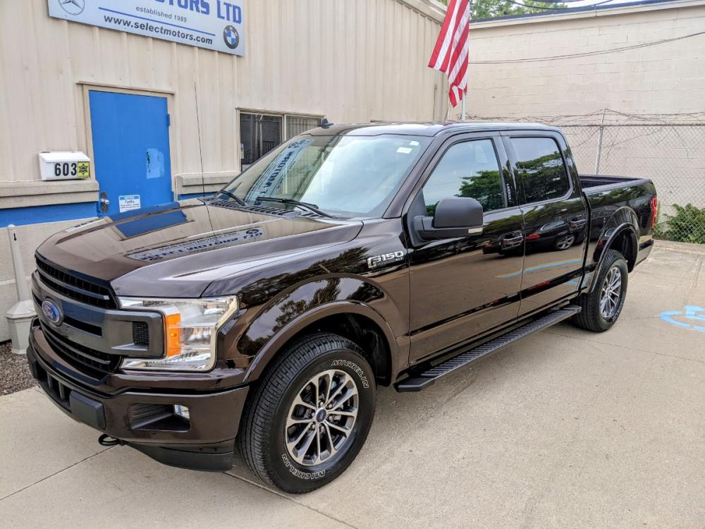 2019 Magma Red Metallic /Black Ford F-150 XLT SuperCrew 5.5-ft. Bed 4WD (1FTEW1EP4KF) with an 2.7L V6 DOHC 24V engine, 6A transmission, located at 603 Amelia Street, Plymouth, MI, 48170, (734) 459-5520, 42.378841, -83.464546 - **During the COVID-19 pandemic, our showroom is open BY APPOINTMENT for serious, qualified buyers. Please call for details - 734-459-5520, text 734-658-4573 or contact us via our web site at www.selectmotors.com Thank you.** See our web site at: http://www.selectmotors.com for complete Inventor - Photo #0