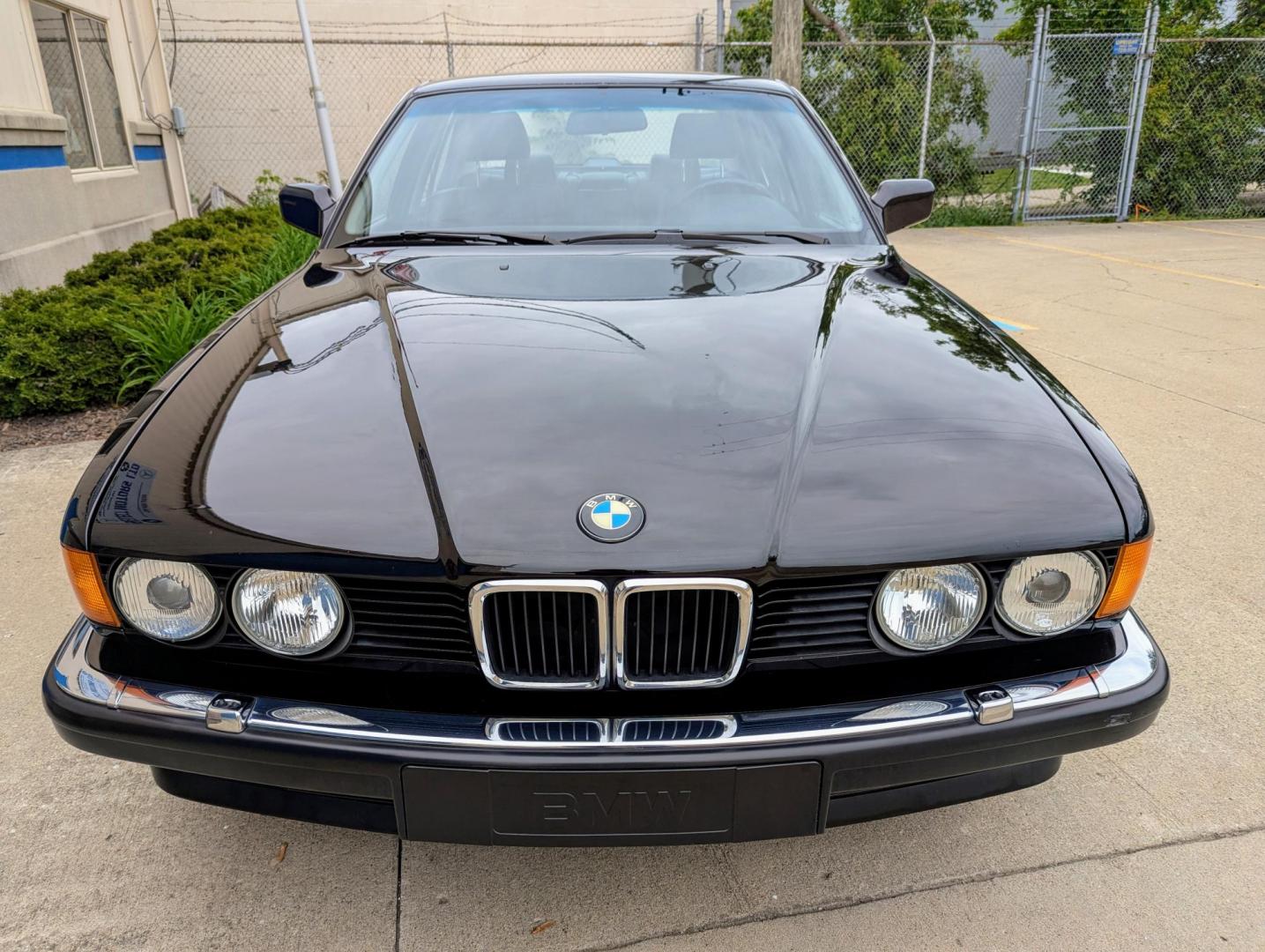 1990 Black /Black Leather BMW 7-Series 735iL (WBAGC4315LD) with an 3.4L L6 SOHC 12V engine, 4-Speed Automatic Overdrive transmission, located at 603 Amelia Street, Plymouth, MI, 48170, (734) 459-5520, 42.378841, -83.464546 - Vehicles shown by appointment - Please call ahead - 734-459-5520, text 734-658-4573 or contact us via our web site at: http://www.selectmotors.com for complete Inventory, Photos, Videos and FREE Carfax Reports. 1990 BMW 735iL, Black with black leather interior, 59K miles. Last owner purchased in - Photo#2