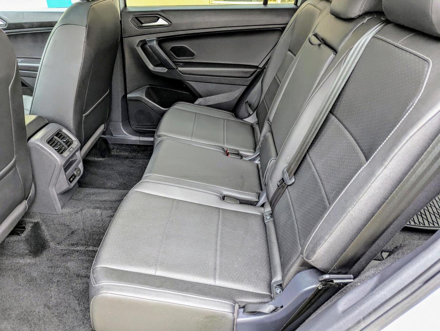 2019 White /Black Volkswagen Tiguan SE 4Motion AWD (3VV2B7AX6KM) with an 2.0L L4 DOHC 16V TURBO engine, 8A transmission, located at 603 Amelia Street, Plymouth, MI, 48170, (734) 459-5520, 42.378841, -83.464546 - Vehicles shown by appointment - Please call ahead - 734-459-5520, text 734-658-4573 or contact us via our web site at: http://www.selectmotors.com for complete Inventory, Photos, Videos and FREE Carfax Reports. 2019 VW Tiguan SEL, White Pearl Metallic with black interior, 85K miles, All Wheel Dri - Photo#5