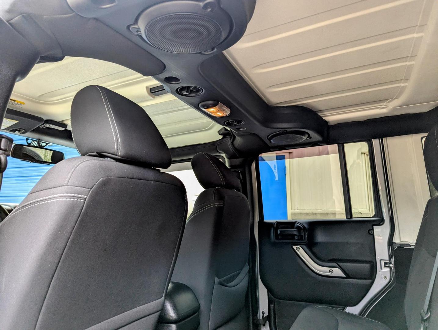 2013 Silver Metallic /Black Jeep Wrangler Unlimited Sahara 4WD (1C4BJWEG3DL) with an 3.6L V6 DOHC 24V FFV engine, Automatic transmission, located at 603 Amelia Street, Plymouth, MI, 48170, (734) 459-5520, 42.378841, -83.464546 - Vehicles shown by appointment - Please call ahead - 734-459-5520, text 734-658-4573 or contact us via our web site at: http://www.selectmotors.com for complete Inventory, Photos, Videos and FREE Carfax Reports. 2013 Jeep Wrangler Unlimited Sahara. Billet Silver Metallic with black interior, 175K - Photo#5