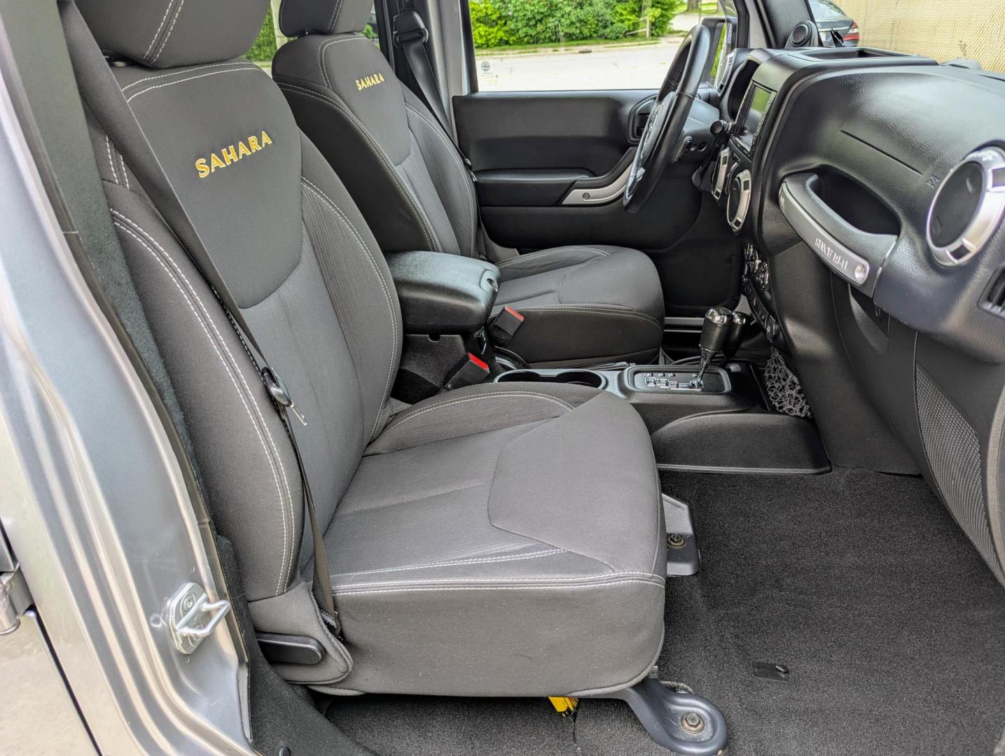2013 Silver Metallic /Black Jeep Wrangler Unlimited Sahara 4WD (1C4BJWEG3DL) with an 3.6L V6 DOHC 24V FFV engine, Automatic transmission, located at 603 Amelia Street, Plymouth, MI, 48170, (734) 459-5520, 42.378841, -83.464546 - Vehicles shown by appointment - Please call ahead - 734-459-5520, text 734-658-4573 or contact us via our web site at: http://www.selectmotors.com for complete Inventory, Photos, Videos and FREE Carfax Reports. 2013 Jeep Wrangler Unlimited Sahara. Billet Silver Metallic with black interior, 175K - Photo#9