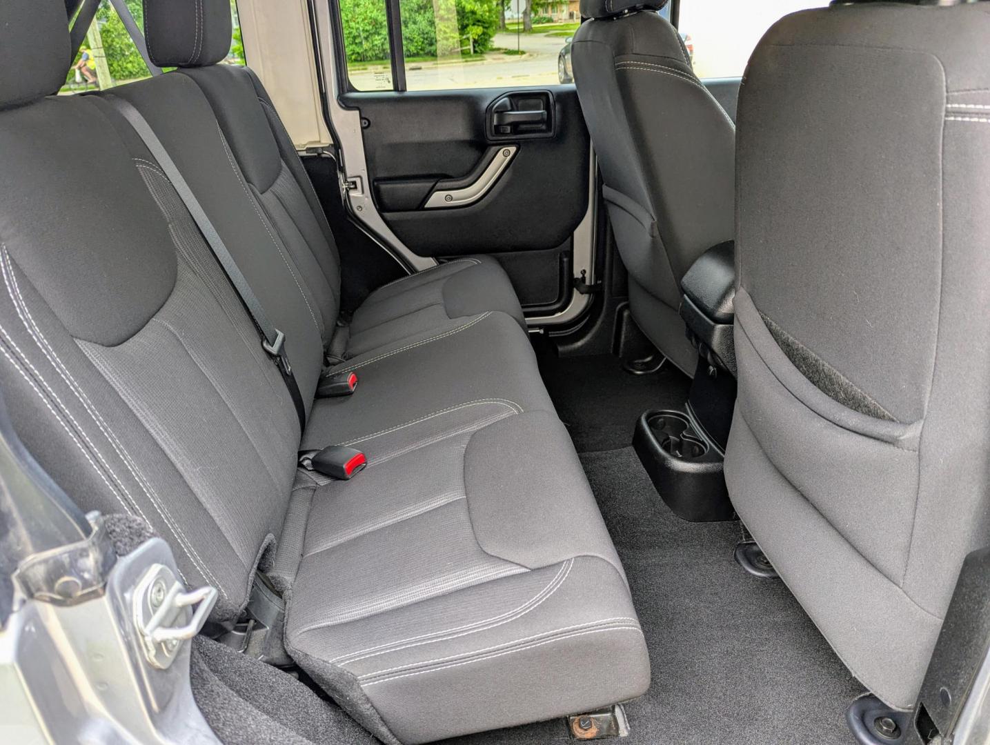 2013 Silver Metallic /Black Jeep Wrangler Unlimited Sahara 4WD (1C4BJWEG3DL) with an 3.6L V6 DOHC 24V FFV engine, Automatic transmission, located at 603 Amelia Street, Plymouth, MI, 48170, (734) 459-5520, 42.378841, -83.464546 - Vehicles shown by appointment - Please call ahead - 734-459-5520, text 734-658-4573 or contact us via our web site at: http://www.selectmotors.com for complete Inventory, Photos, Videos and FREE Carfax Reports. 2013 Jeep Wrangler Unlimited Sahara. Billet Silver Metallic with black interior, 175K - Photo#8