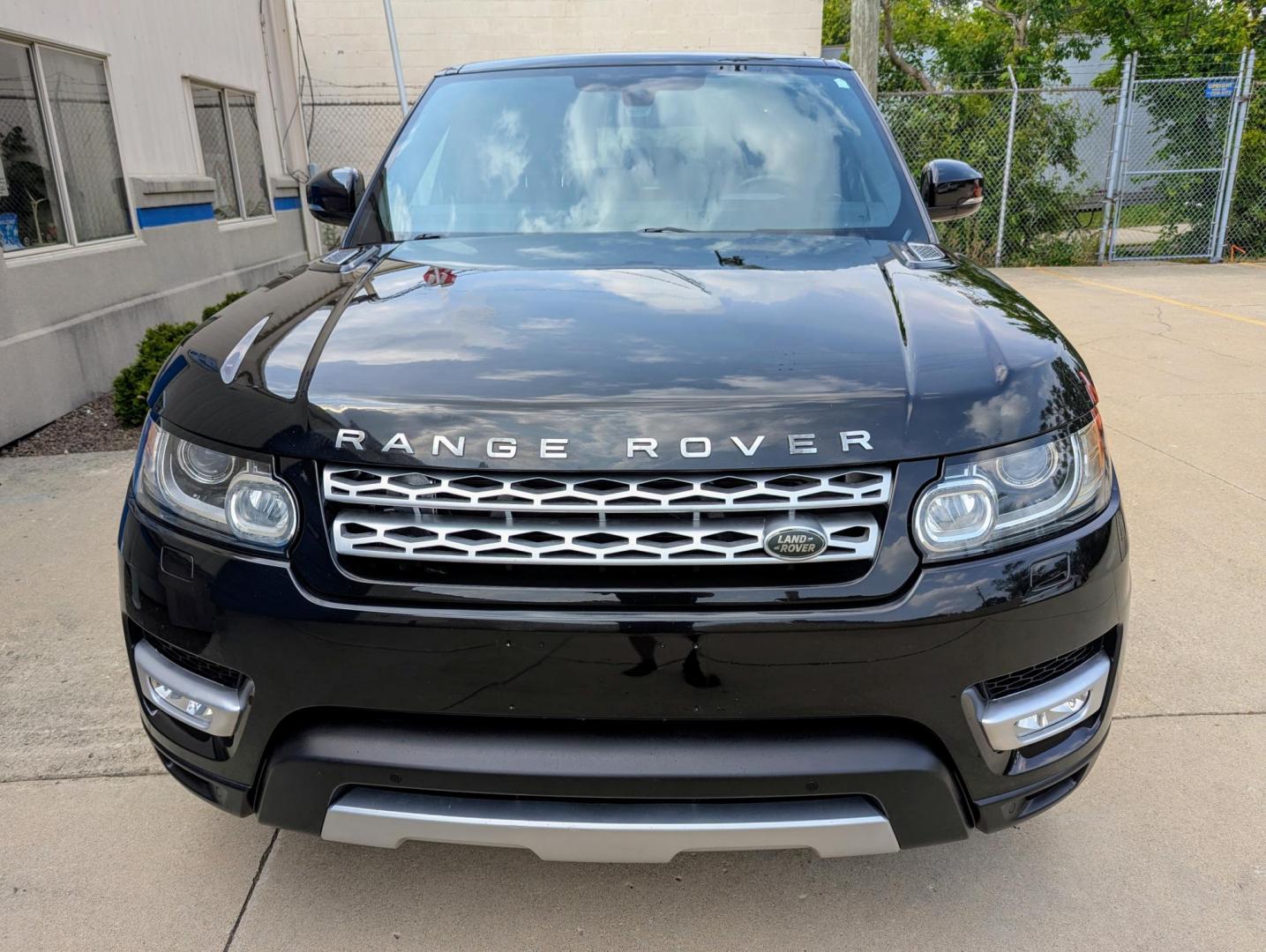 2015 Black /Black & Ivory Land Rover Range Rover Sport SE (SALWR2VF3FA) with an 3.0L V6 24V DOHC SUPERCHARGED engine, 8-Speed Automatic transmission, located at 603 Amelia Street, Plymouth, MI, 48170, (734) 459-5520, 42.378841, -83.464546 - Vehicles shown by appointment - Please call ahead - 734-459-5520, text 734-658-4573 or contact us via our web site at: http://www.selectmotors.com for complete Inventory, Photos, Videos and FREE Carfax Reports. 2015 Land Rover Range Rover HSE Sport, Santorini Black Metallic, black & ivory interio - Photo#1