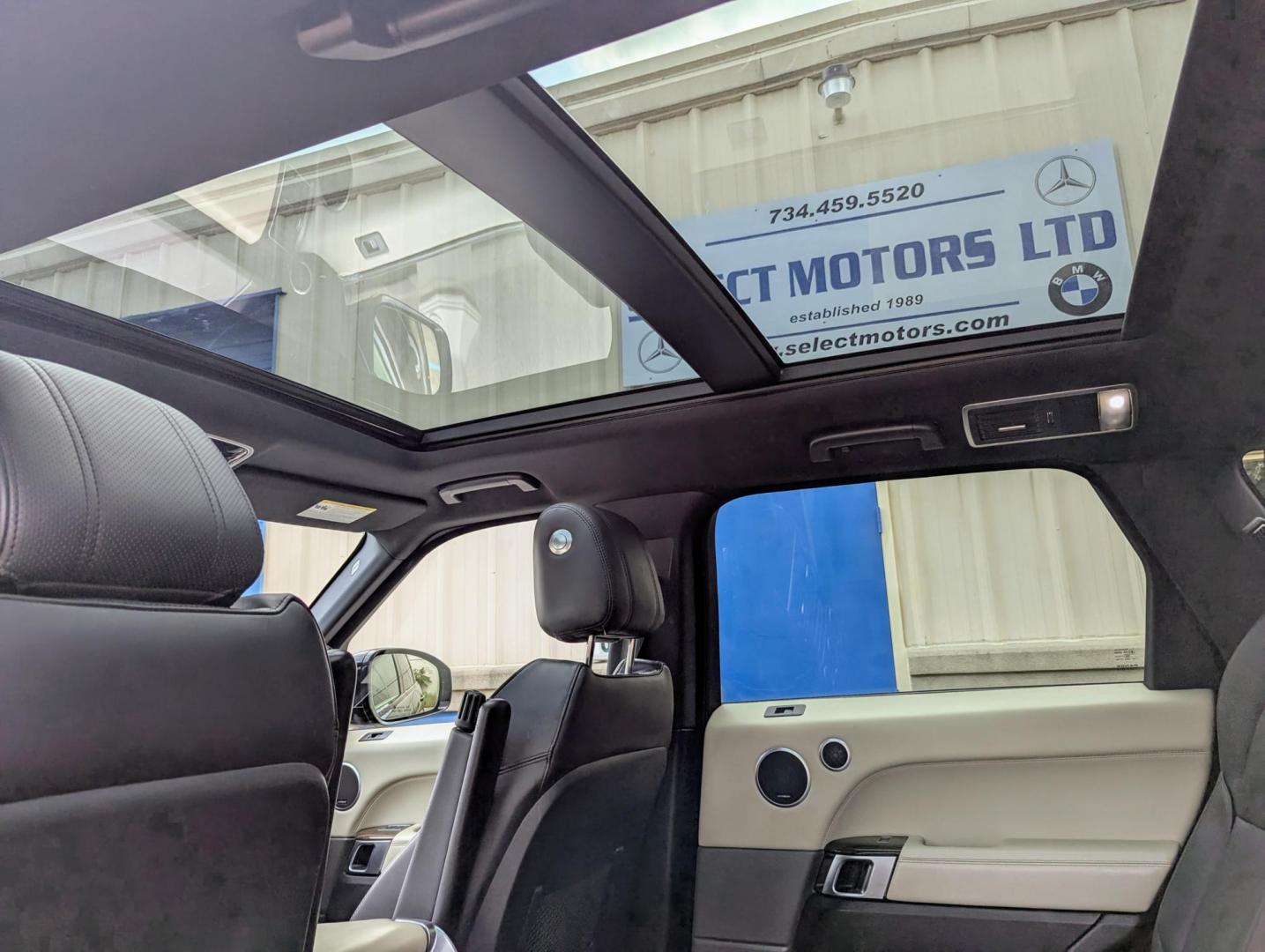 2015 Black /Black & Ivory Land Rover Range Rover Sport SE (SALWR2VF3FA) with an 3.0L V6 24V DOHC SUPERCHARGED engine, 8-Speed Automatic transmission, located at 603 Amelia Street, Plymouth, MI, 48170, (734) 459-5520, 42.378841, -83.464546 - Vehicles shown by appointment - Please call ahead - 734-459-5520, text 734-658-4573 or contact us via our web site at: http://www.selectmotors.com for complete Inventory, Photos, Videos and FREE Carfax Reports. 2015 Land Rover Range Rover HSE Sport, Santorini Black Metallic, black & ivory interio - Photo#5