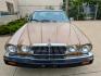 1985 Silver Sand Metallic /Ivory Leather Jaguar XJ6 Vanden Plas (SAJAY1346FC) with an 4.2L L6 DOHC 24V engine, Automatic transmission, located at 603 Amelia Street, Plymouth, MI, 48170, (734) 459-5520, 42.378841, -83.464546 - Vehicles shown by appointment - Please call ahead - 734-459-5520, text 734-658-4573 or contact us via our web site at: http://www.selectmotors.com for complete Inventory, Photos, Videos and FREE Carfax Reports. Warranty included. 1985 Jaguar Vanden Plas, Silver Sand Metallic with Ivory Leather i - Photo#2