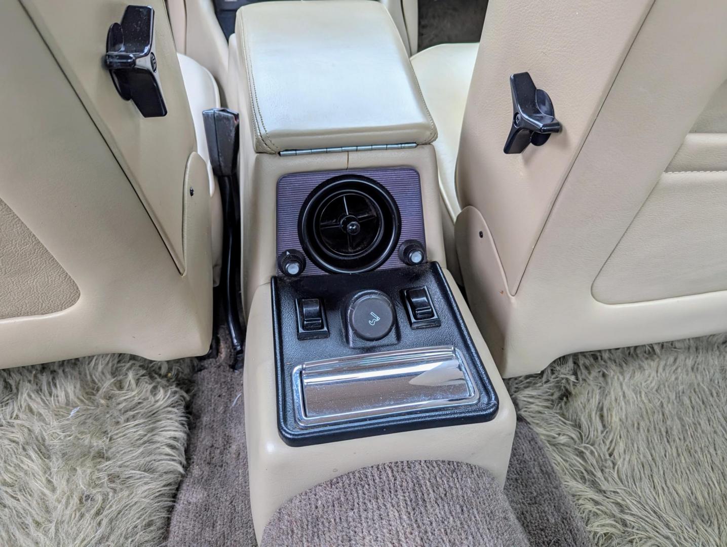 1985 Silver Sand Metallic /Ivory Leather Jaguar XJ6 Vanden Plas (SAJAY1346FC) with an 4.2L L6 DOHC 24V engine, Automatic transmission, located at 603 Amelia Street, Plymouth, MI, 48170, (734) 459-5520, 42.378841, -83.464546 - Vehicles shown by appointment - Please call ahead - 734-459-5520, text 734-658-4573 or contact us via our web site at: http://www.selectmotors.com for complete Inventory, Photos, Videos and FREE Carfax Reports. Warranty included. 1985 Jaguar Vanden Plas, Silver Sand Metallic with Ivory Leather i - Photo#7