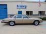 1985 Silver Sand Metallic /Ivory Leather Jaguar XJ6 Vanden Plas (SAJAY1346FC) with an 4.2L L6 DOHC 24V engine, Automatic transmission, located at 603 Amelia Street, Plymouth, MI, 48170, (734) 459-5520, 42.378841, -83.464546 - Vehicles shown by appointment - Please call ahead - 734-459-5520, text 734-658-4573 or contact us via our web site at: http://www.selectmotors.com for complete Inventory, Photos, Videos and FREE Carfax Reports. Warranty included. 1985 Jaguar Vanden Plas, Silver Sand Metallic with Ivory Leather i - Photo#12