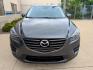 2016 Meteor Gray Mica /Black Leather Mazda CX-5 Grand Touring AWD (JM3KE4DY5G0) with an 2.5L L4 DOHC 16V engine, 6-Speed Automatic transmission, located at 603 Amelia Street, Plymouth, MI, 48170, (734) 459-5520, 42.378841, -83.464546 - Vehicles shown by appointment - Please call ahead - 734-459-5520, text 734-658-4573 or contact us via our web site at: http://www.selectmotors.com for complete Inventory, Photos, Videos and FREE Carfax Reports. 2016 Mazda CX5 Grand Touring, Meteor Gray Mica, Black leather interior, 134K one owner - Photo#1