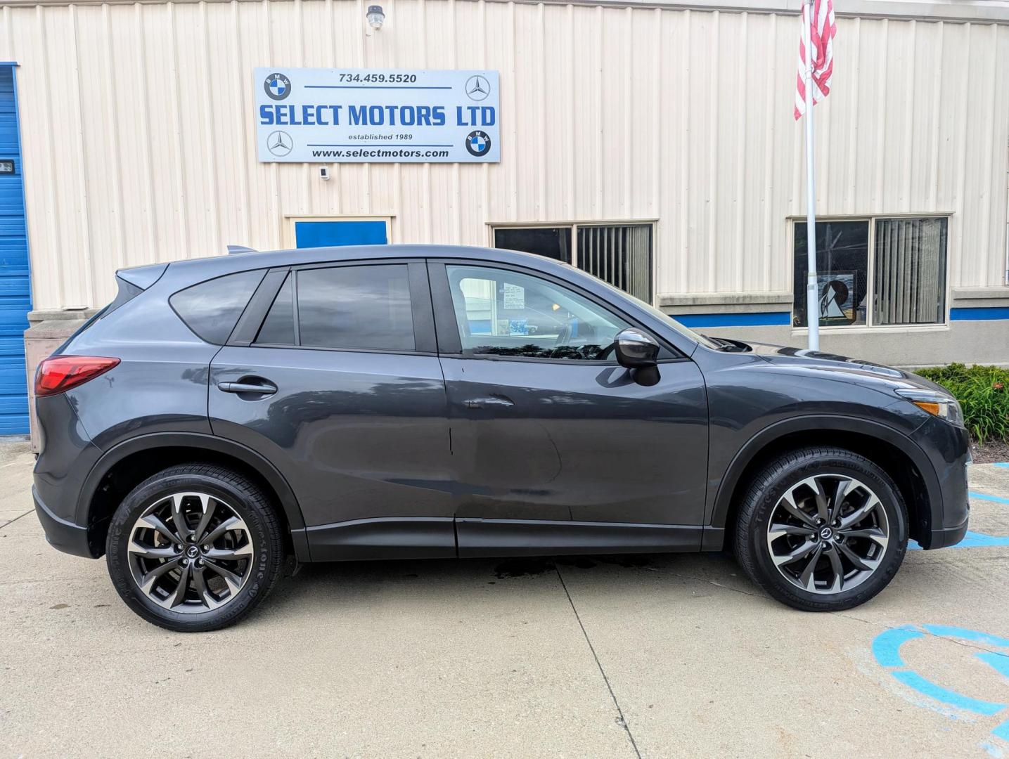 2016 Meteor Gray Mica /Black Leather Mazda CX-5 Grand Touring AWD (JM3KE4DY5G0) with an 2.5L L4 DOHC 16V engine, 6-Speed Automatic transmission, located at 603 Amelia Street, Plymouth, MI, 48170, (734) 459-5520, 42.378841, -83.464546 - Vehicles shown by appointment - Please call ahead - 734-459-5520, text 734-658-4573 or contact us via our web site at: http://www.selectmotors.com for complete Inventory, Photos, Videos and FREE Carfax Reports. 2016 Mazda CX5 Grand Touring, Meteor Gray Mica, Black leather interior, 134K one owner - Photo#12