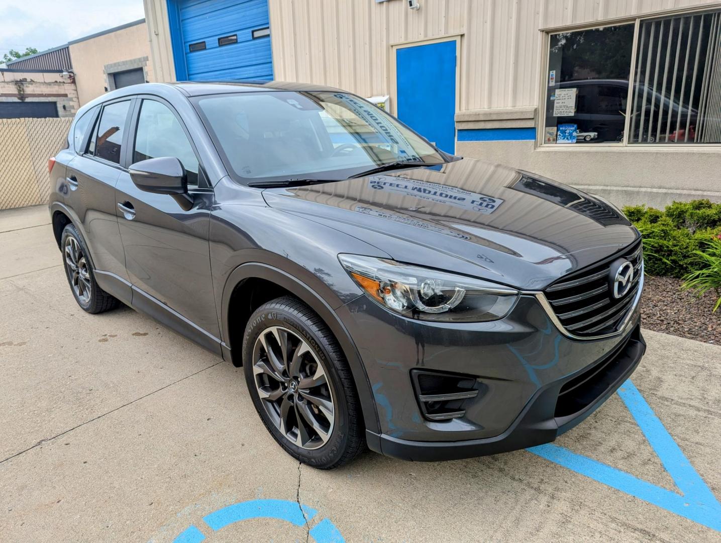 2016 Meteor Gray Mica /Black Leather Mazda CX-5 Grand Touring AWD (JM3KE4DY5G0) with an 2.5L L4 DOHC 16V engine, 6-Speed Automatic transmission, located at 603 Amelia Street, Plymouth, MI, 48170, (734) 459-5520, 42.378841, -83.464546 - Vehicles shown by appointment - Please call ahead - 734-459-5520, text 734-658-4573 or contact us via our web site at: http://www.selectmotors.com for complete Inventory, Photos, Videos and FREE Carfax Reports. 2016 Mazda CX5 Grand Touring, Meteor Gray Mica, Black leather interior, 134K one owner - Photo#11