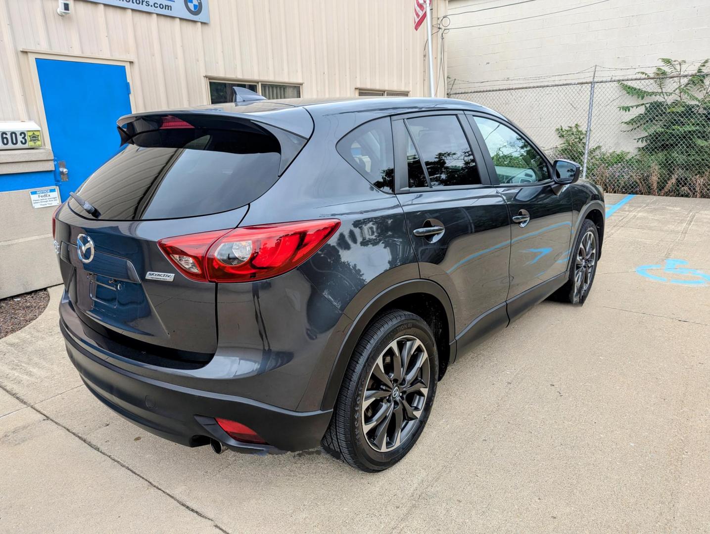 2016 Meteor Gray Mica /Black Leather Mazda CX-5 Grand Touring AWD (JM3KE4DY5G0) with an 2.5L L4 DOHC 16V engine, 6-Speed Automatic transmission, located at 603 Amelia Street, Plymouth, MI, 48170, (734) 459-5520, 42.378841, -83.464546 - Vehicles shown by appointment - Please call ahead - 734-459-5520, text 734-658-4573 or contact us via our web site at: http://www.selectmotors.com for complete Inventory, Photos, Videos and FREE Carfax Reports. 2016 Mazda CX5 Grand Touring, Meteor Gray Mica, Black leather interior, 134K one owner - Photo#13