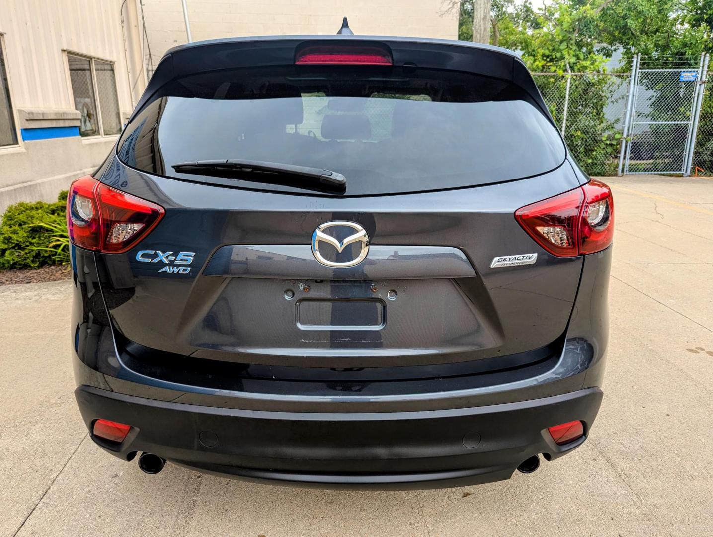 2016 Meteor Gray Mica /Black Leather Mazda CX-5 Grand Touring AWD (JM3KE4DY5G0) with an 2.5L L4 DOHC 16V engine, 6-Speed Automatic transmission, located at 603 Amelia Street, Plymouth, MI, 48170, (734) 459-5520, 42.378841, -83.464546 - Vehicles shown by appointment - Please call ahead - 734-459-5520, text 734-658-4573 or contact us via our web site at: http://www.selectmotors.com for complete Inventory, Photos, Videos and FREE Carfax Reports. 2016 Mazda CX5 Grand Touring, Meteor Gray Mica, Black leather interior, 134K one owner - Photo#14