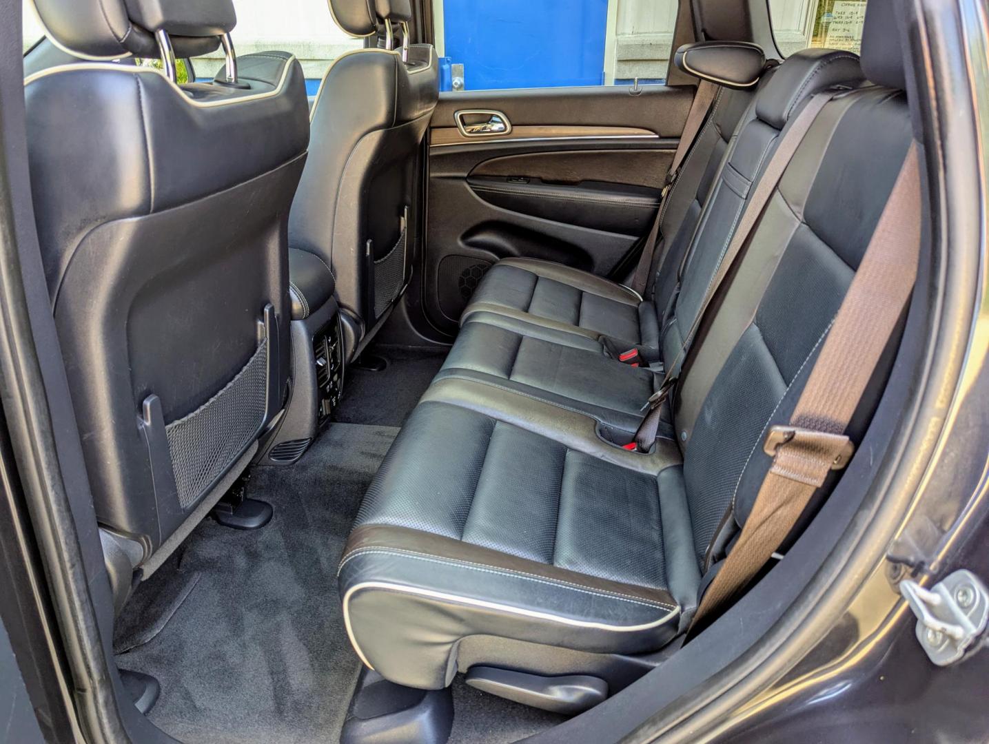 2014 Maximum Steel Metallic /Indigo Blue & Brown Leather Jeep Grand Cherokee Overland 4WD (1C4RJFCG5EC) with an 3.6L V6 DOHC 24V engine, 5-Speed Automatic transmission, located at 603 Amelia Street, Plymouth, MI, 48170, (734) 459-5520, 42.378841, -83.464546 - Vehicles shown by appointment - Please call ahead - 734-459-5520, text 734-658-4573 or contact us via our web site at: http://www.selectmotors.com for complete Inventory, Photos, Videos and FREE Carfax Reports. 2014 Jeep Grand Cherokee Overland, Maximum Steel Metallic with Indigo Blue & Brown int - Photo#4