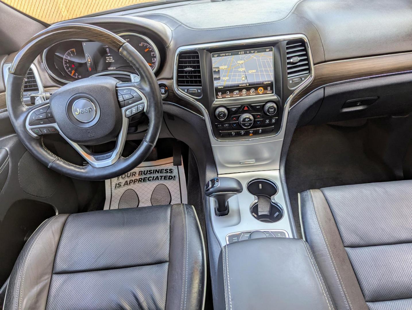 2014 Maximum Steel Metallic /Indigo Blue & Brown Leather Jeep Grand Cherokee Overland 4WD (1C4RJFCG5EC) with an 3.6L V6 DOHC 24V engine, 5-Speed Automatic transmission, located at 603 Amelia Street, Plymouth, MI, 48170, (734) 459-5520, 42.378841, -83.464546 - Vehicles shown by appointment - Please call ahead - 734-459-5520, text 734-658-4573 or contact us via our web site at: http://www.selectmotors.com for complete Inventory, Photos, Videos and FREE Carfax Reports. 2014 Jeep Grand Cherokee Overland, Maximum Steel Metallic with Indigo Blue & Brown int - Photo#8