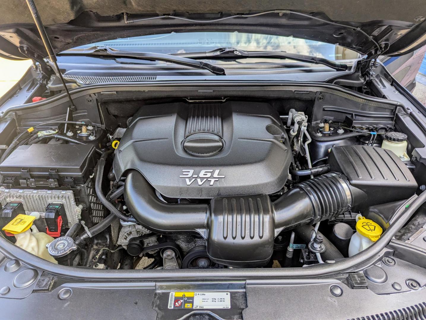 2014 Maximum Steel Metallic /Indigo Blue & Brown Leather Jeep Grand Cherokee Overland 4WD (1C4RJFCG5EC) with an 3.6L V6 DOHC 24V engine, 5-Speed Automatic transmission, located at 603 Amelia Street, Plymouth, MI, 48170, (734) 459-5520, 42.378841, -83.464546 - Vehicles shown by appointment - Please call ahead - 734-459-5520, text 734-658-4573 or contact us via our web site at: http://www.selectmotors.com for complete Inventory, Photos, Videos and FREE Carfax Reports. 2014 Jeep Grand Cherokee Overland, Maximum Steel Metallic with Indigo Blue & Brown int - Photo#14