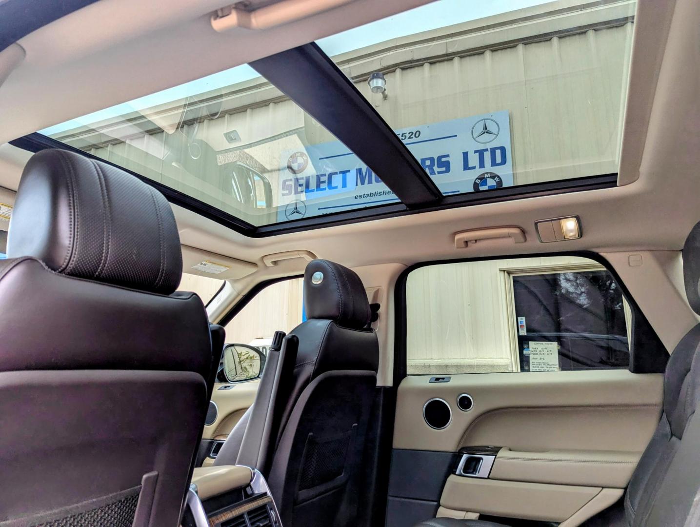 2015 Dark Green Metallic /Expresso & Ivory Leather Land Rover Range Rover Sport SE (SALWR2VF5FA) with an 3.0L V6 24V DOHC SUPERCHARGED engine, 8-Speed Automatic transmission, located at 603 Amelia Street, Plymouth, MI, 48170, (734) 459-5520, 42.378841, -83.464546 - Vehicles shown by appointment - Please call ahead - 734-459-5520, text 734-658-4573 or contact us via our web site at: http://www.selectmotors.com for complete Inventory, Photos, Videos and FREE Carfax Reports. 2015 Land Rover Range Rover Sport HSE - Dark Green Metallic with Espresso & Ivory leat - Photo#5