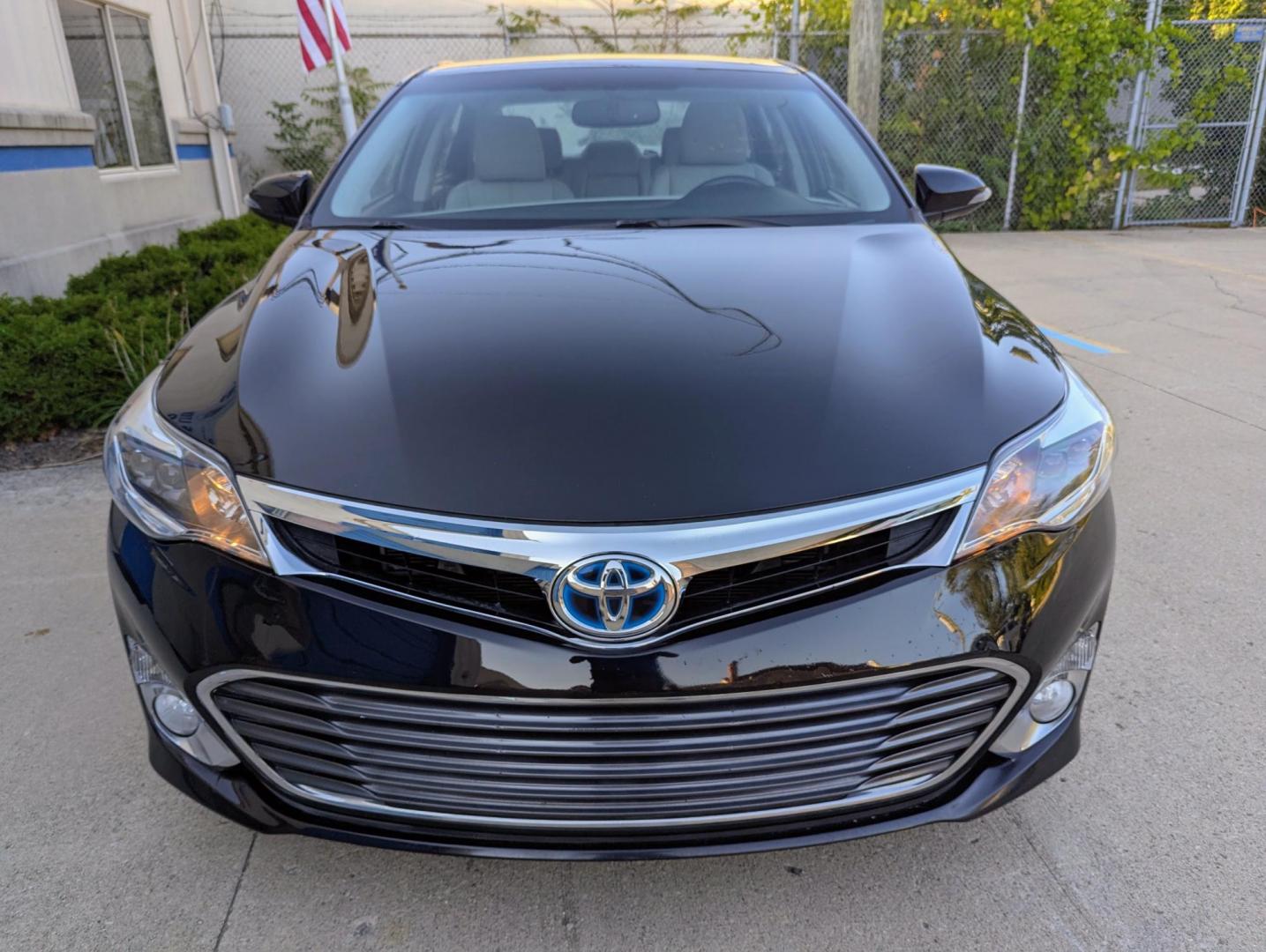 2014 Black /Light Gray Leather Toyota Avalon Hybrid XLE Premium (4T1BD1EB9EU) with an 2.5L L4 DOHC 16V HYBRID engine, Continuously Variable Transmission transmission, located at 603 Amelia Street, Plymouth, MI, 48170, (734) 459-5520, 42.378841, -83.464546 - Vehicles shown by appointment - Please call ahead - 734-459-5520, text 734-658-4573 or contact us via our web site at: http://www.selectmotors.com for complete Inventory, Photos, Videos and FREE Carfax Reports. 2014 Toyota Avalon, Hybrid - Touring, Black with light gray leather interior, 95K one - Photo#1