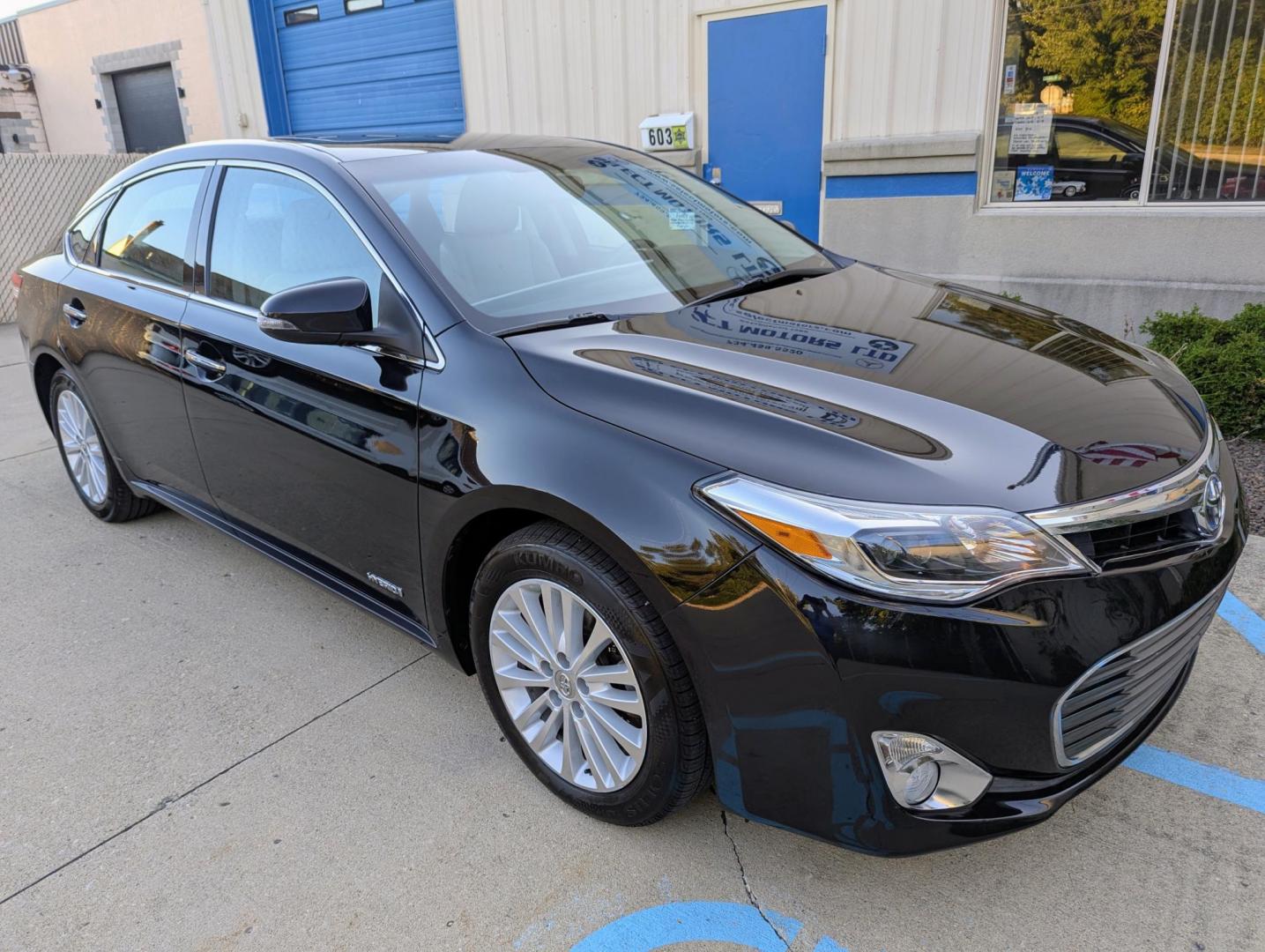 2014 Black /Light Gray Leather Toyota Avalon Hybrid XLE Premium (4T1BD1EB9EU) with an 2.5L L4 DOHC 16V HYBRID engine, Continuously Variable Transmission transmission, located at 603 Amelia Street, Plymouth, MI, 48170, (734) 459-5520, 42.378841, -83.464546 - Vehicles shown by appointment - Please call ahead - 734-459-5520, text 734-658-4573 or contact us via our web site at: http://www.selectmotors.com for complete Inventory, Photos, Videos and FREE Carfax Reports. 2014 Toyota Avalon, Hybrid - Touring, Black with light gray leather interior, 95K one - Photo#10