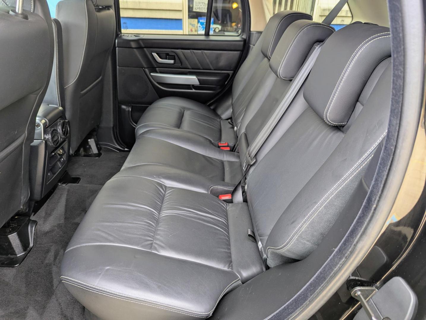 2009 Black /Black Leather Land Rover Range Rover Sport HSE (SALSK25499A) with an 4.4L V8 DOHC 32V engine, 6-Speed Automatic Overdrive transmission, located at 603 Amelia Street, Plymouth, MI, 48170, (734) 459-5520, 42.378841, -83.464546 - Vehicles shown by appointment - Please call ahead - 734-459-5520, text 734-658-4573 or contact us via our web site at: http://www.selectmotors.com for complete Inventory, Photos, Videos and FREE Carfax Reports. 2009 Land Rover Range Rover Sport HSE Luxury, Santorini Black with Black leather inter - Photo#8