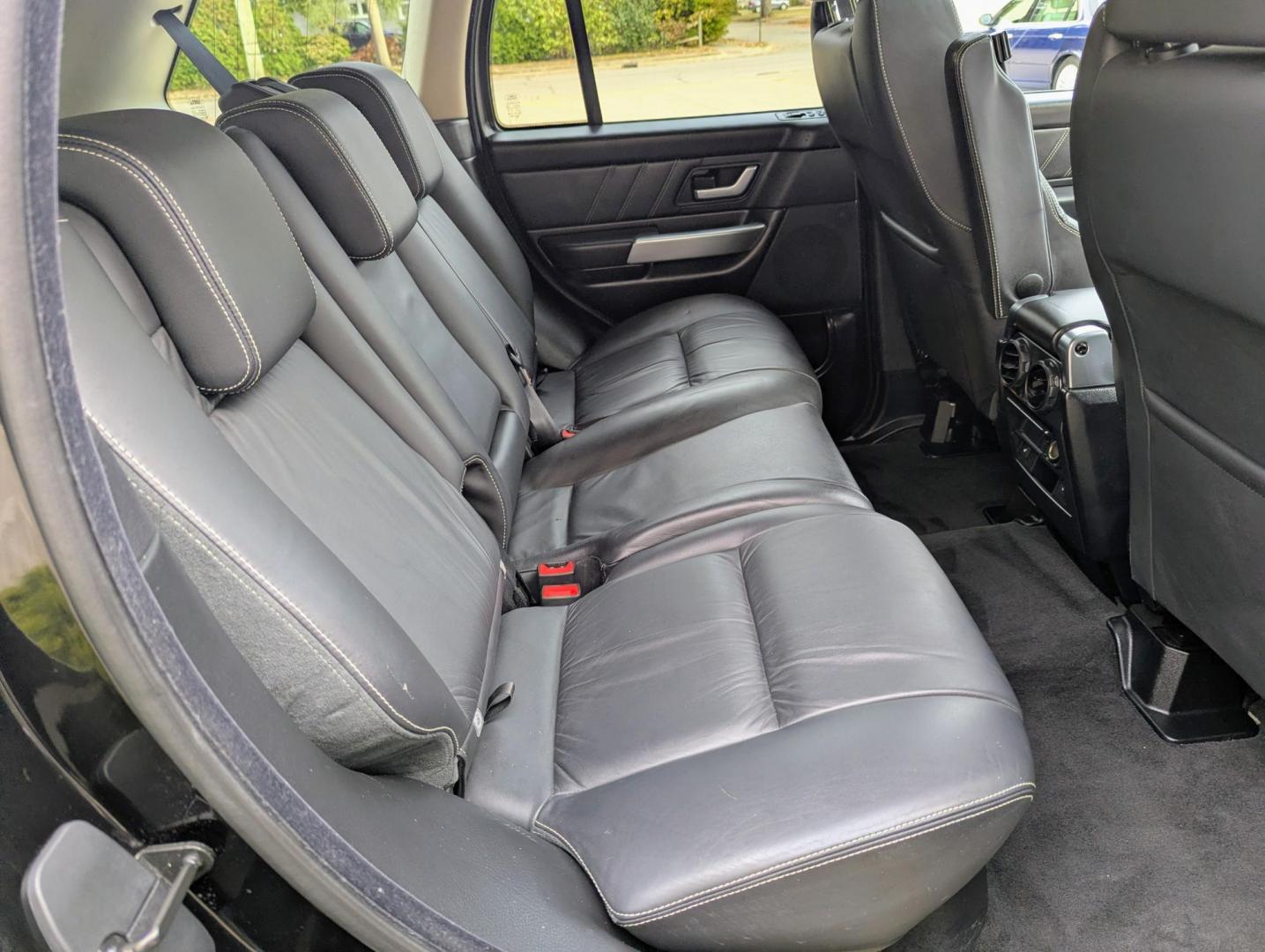 2009 Black /Black Leather Land Rover Range Rover Sport HSE (SALSK25499A) with an 4.4L V8 DOHC 32V engine, 6-Speed Automatic Overdrive transmission, located at 603 Amelia Street, Plymouth, MI, 48170, (734) 459-5520, 42.378841, -83.464546 - Vehicles shown by appointment - Please call ahead - 734-459-5520, text 734-658-4573 or contact us via our web site at: http://www.selectmotors.com for complete Inventory, Photos, Videos and FREE Carfax Reports. 2009 Land Rover Range Rover Sport HSE Luxury, Santorini Black with Black leather inter - Photo#12