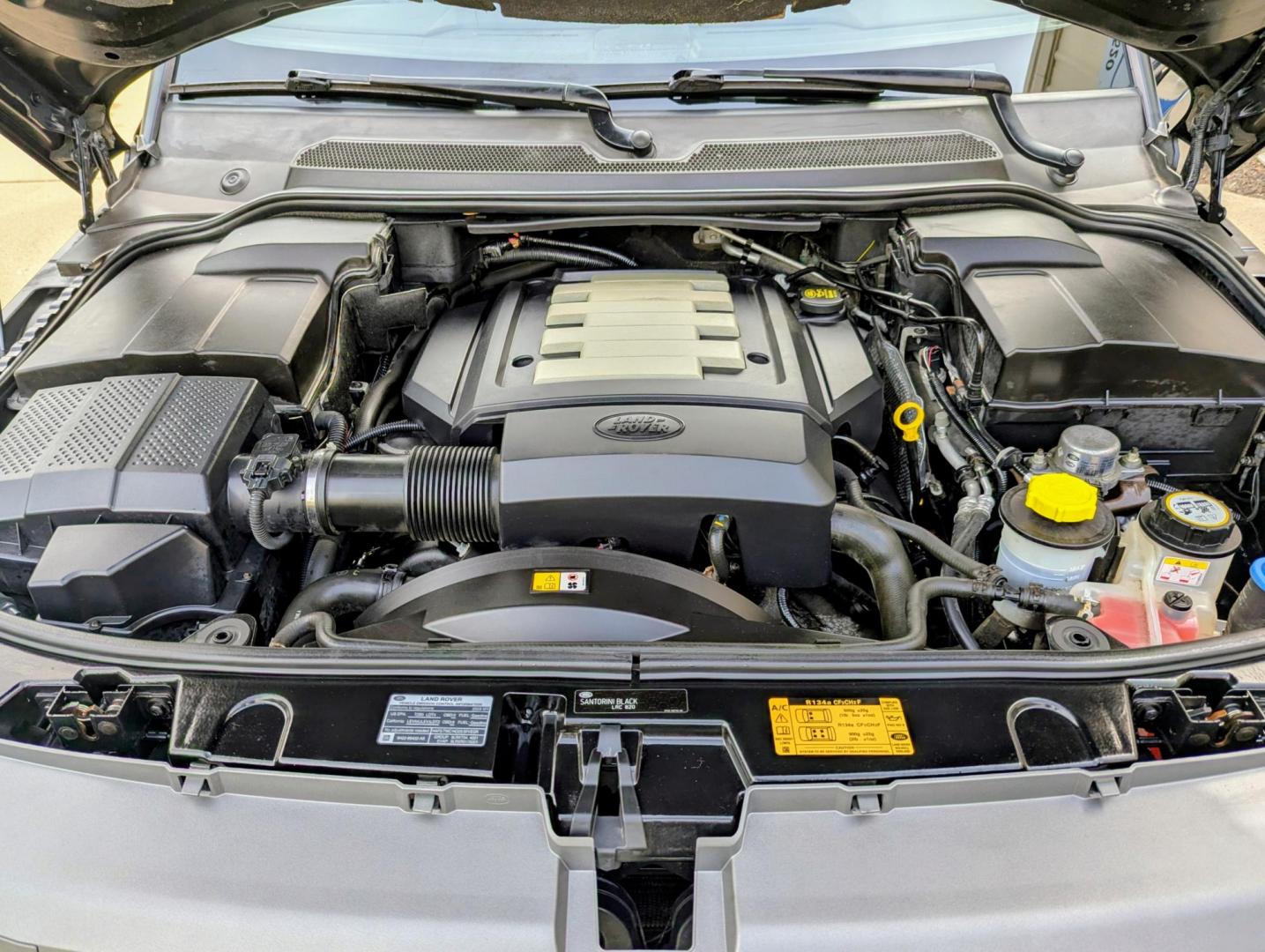 2009 Black /Black Leather Land Rover Range Rover Sport HSE (SALSK25499A) with an 4.4L V8 DOHC 32V engine, 6-Speed Automatic Overdrive transmission, located at 603 Amelia Street, Plymouth, MI, 48170, (734) 459-5520, 42.378841, -83.464546 - Vehicles shown by appointment - Please call ahead - 734-459-5520, text 734-658-4573 or contact us via our web site at: http://www.selectmotors.com for complete Inventory, Photos, Videos and FREE Carfax Reports. 2009 Land Rover Range Rover Sport HSE Luxury, Santorini Black with Black leather inter - Photo#21