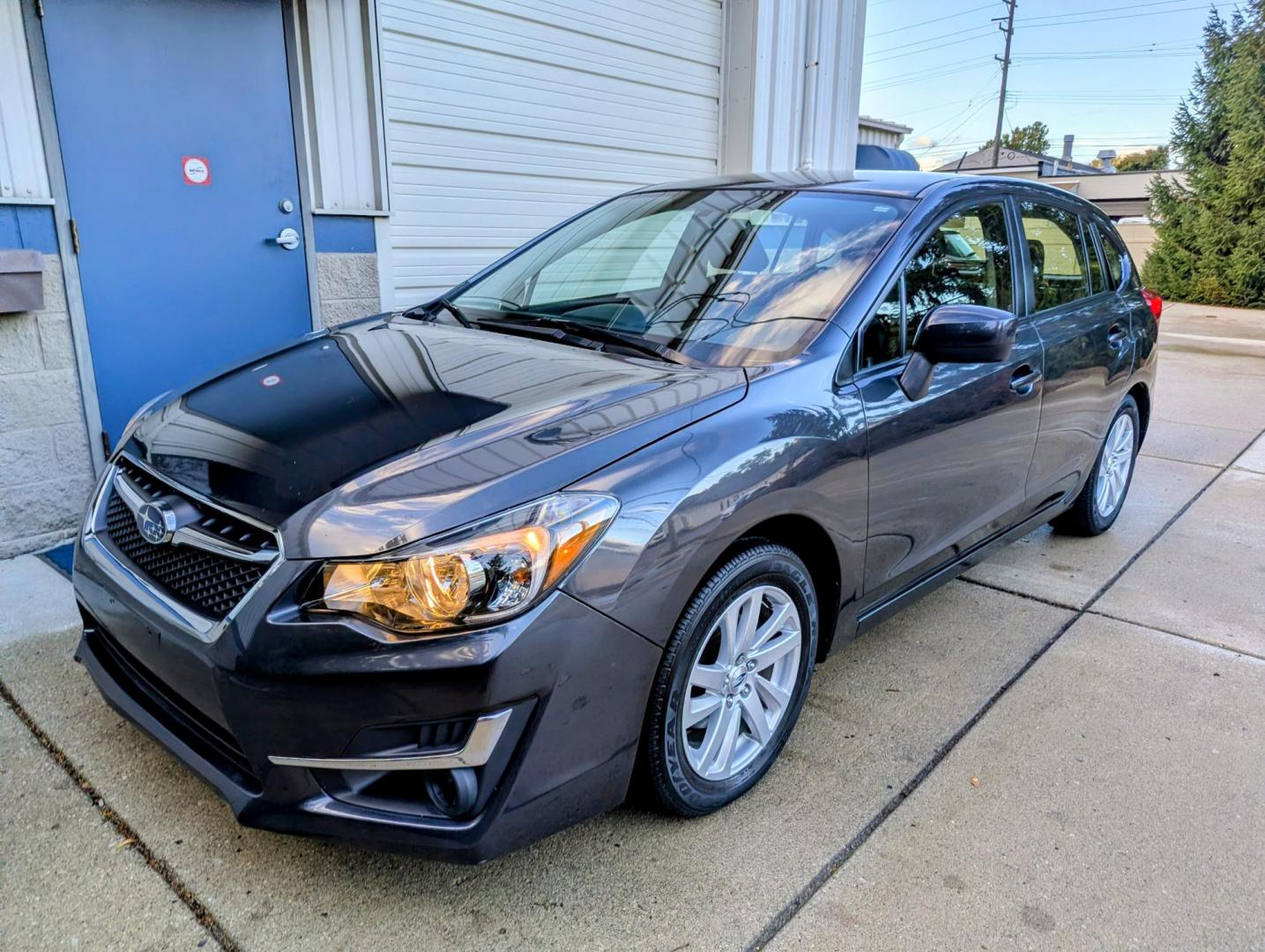 2016 Dark Grey Metallic /Black Subaru Impreza 2.0i Premium PZEV 5-Door (JF1GPAB6XG8) with an 2.0L H4 DOHC 16V engine, CVT transmission, located at 603 Amelia Street, Plymouth, MI, 48170, (734) 459-5520, 42.378841, -83.464546 - Vehicles shown by appointment - Please call ahead - 734-459-5520, text 734-658-4573 or contact us via our web site at: http://www.selectmotors.com for complete Inventory, Photos, Videos and FREE Carfax Reports. 2016 Subaru Impreza wagon, 5 door, 2.0 Premium. Dark Grey Metallic with black interior - Photo#0