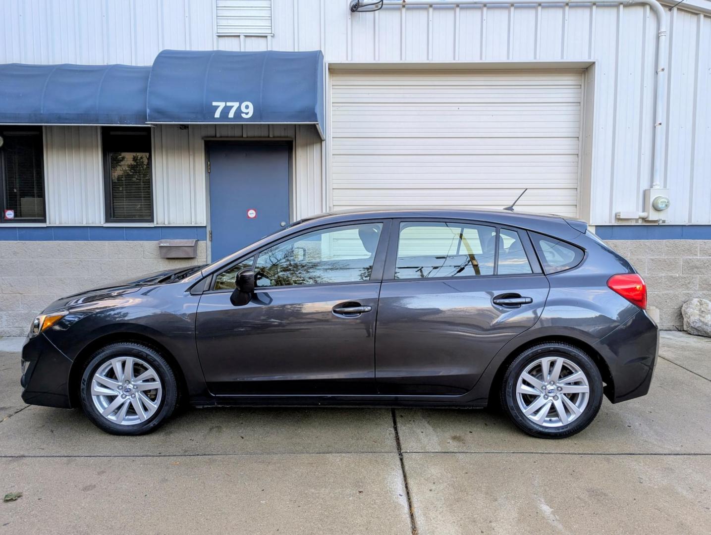 2016 Dark Grey Metallic /Black Subaru Impreza 2.0i Premium PZEV 5-Door (JF1GPAB6XG8) with an 2.0L H4 DOHC 16V engine, CVT transmission, located at 603 Amelia Street, Plymouth, MI, 48170, (734) 459-5520, 42.378841, -83.464546 - Vehicles shown by appointment - Please call ahead - 734-459-5520, text 734-658-4573 or contact us via our web site at: http://www.selectmotors.com for complete Inventory, Photos, Videos and FREE Carfax Reports. 2016 Subaru Impreza wagon, 5 door, 2.0 Premium. Dark Grey Metallic with black interior - Photo#1