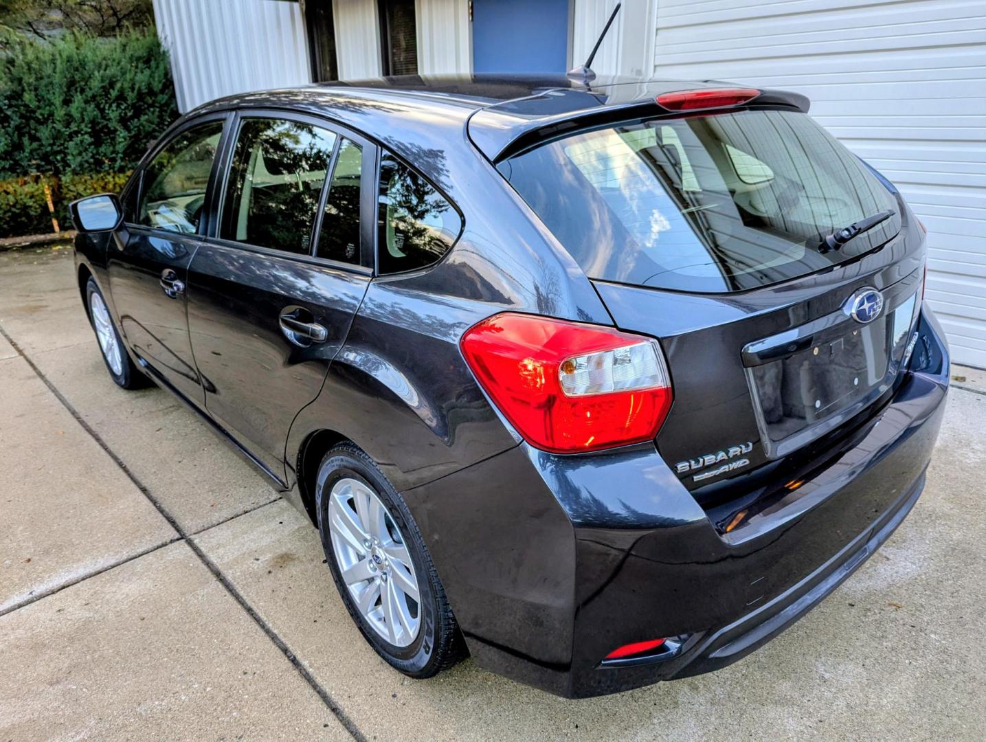 2016 Dark Grey Metallic /Black Subaru Impreza 2.0i Premium PZEV 5-Door (JF1GPAB6XG8) with an 2.0L H4 DOHC 16V engine, CVT transmission, located at 603 Amelia Street, Plymouth, MI, 48170, (734) 459-5520, 42.378841, -83.464546 - Vehicles shown by appointment - Please call ahead - 734-459-5520, text 734-658-4573 or contact us via our web site at: http://www.selectmotors.com for complete Inventory, Photos, Videos and FREE Carfax Reports. 2016 Subaru Impreza wagon, 5 door, 2.0 Premium. Dark Grey Metallic with black interior - Photo#2
