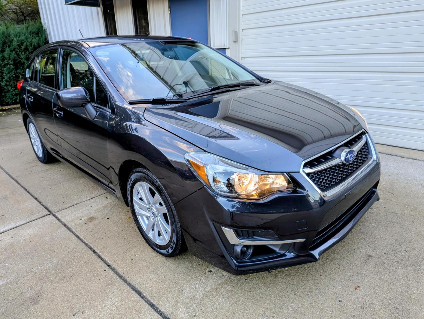 2016 Dark Grey Metallic /Black Subaru Impreza 2.0i Premium PZEV 5-Door (JF1GPAB6XG8) with an 2.0L H4 DOHC 16V engine, CVT transmission, located at 603 Amelia Street, Plymouth, MI, 48170, (734) 459-5520, 42.378841, -83.464546 - Vehicles shown by appointment - Please call ahead - 734-459-5520, text 734-658-4573 or contact us via our web site at: http://www.selectmotors.com for complete Inventory, Photos, Videos and FREE Carfax Reports. 2016 Subaru Impreza wagon, 5 door, 2.0 Premium. Dark Grey Metallic with black interior - Photo#11