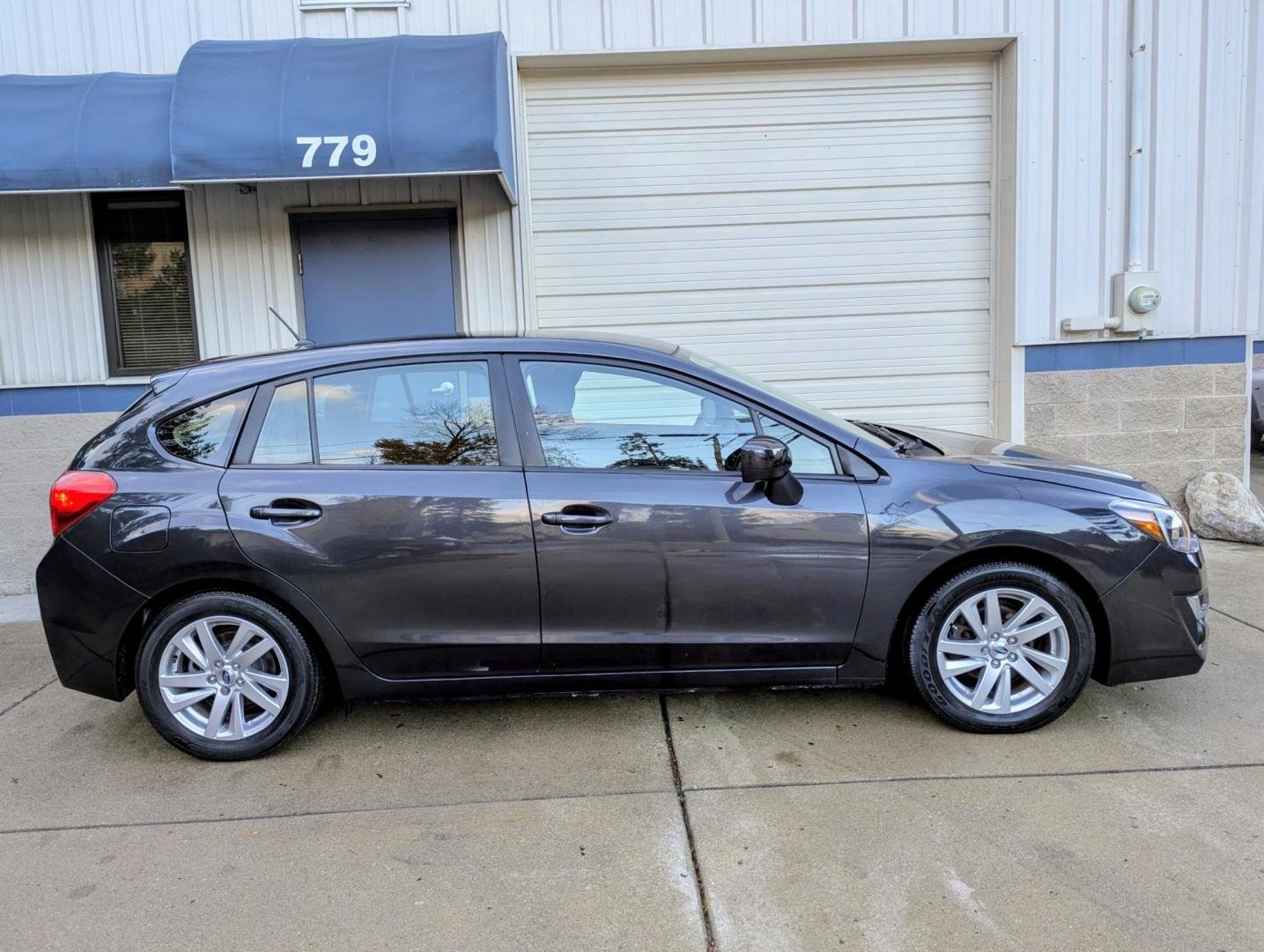 2016 Dark Grey Metallic /Black Subaru Impreza 2.0i Premium PZEV 5-Door (JF1GPAB6XG8) with an 2.0L H4 DOHC 16V engine, CVT transmission, located at 603 Amelia Street, Plymouth, MI, 48170, (734) 459-5520, 42.378841, -83.464546 - Vehicles shown by appointment - Please call ahead - 734-459-5520, text 734-658-4573 or contact us via our web site at: http://www.selectmotors.com for complete Inventory, Photos, Videos and FREE Carfax Reports. 2016 Subaru Impreza wagon, 5 door, 2.0 Premium. Dark Grey Metallic with black interior - Photo#12