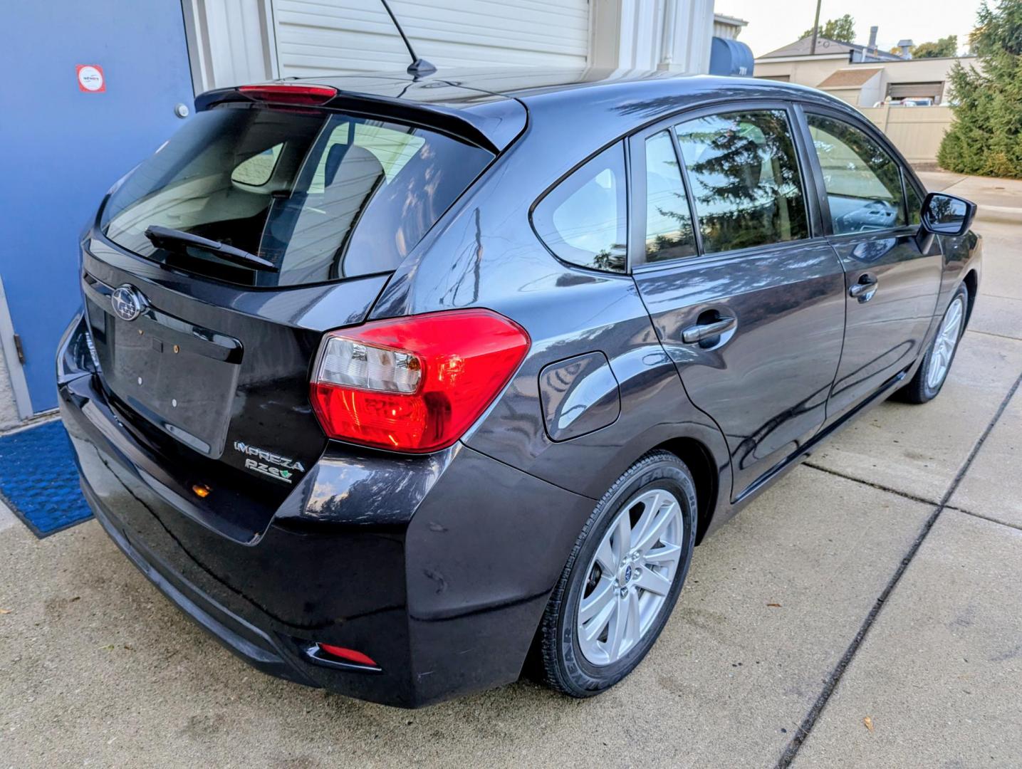 2016 Dark Grey Metallic /Black Subaru Impreza 2.0i Premium PZEV 5-Door (JF1GPAB6XG8) with an 2.0L H4 DOHC 16V engine, CVT transmission, located at 603 Amelia Street, Plymouth, MI, 48170, (734) 459-5520, 42.378841, -83.464546 - Vehicles shown by appointment - Please call ahead - 734-459-5520, text 734-658-4573 or contact us via our web site at: http://www.selectmotors.com for complete Inventory, Photos, Videos and FREE Carfax Reports. 2016 Subaru Impreza wagon, 5 door, 2.0 Premium. Dark Grey Metallic with black interior - Photo#13