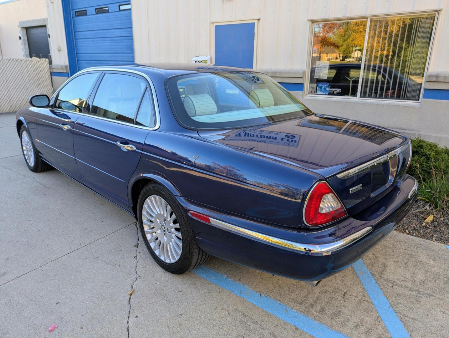 2005 Pacific Blue /Ivory Jaguar XJ-Series Vanden Plas (SAJWA82C05S) with an 4.2L V8 DOHC 32V engine, 6-Speed Automatic Overdrive transmission, located at 603 Amelia Street, Plymouth, MI, 48170, (734) 459-5520, 42.378841, -83.464546 - Vehicles shown by appointment - Please call ahead - 734-459-5520, text 734-658-4573 or contact us via our web site at: http://www.selectmotors.com for complete Inventory, Photos, Videos and FREE Carfax Reports. 2005 Jaguar XJ8 Vanden Plas, Pacific Blue with Ivory interior, one owner, 68K miles. P - Photo#3