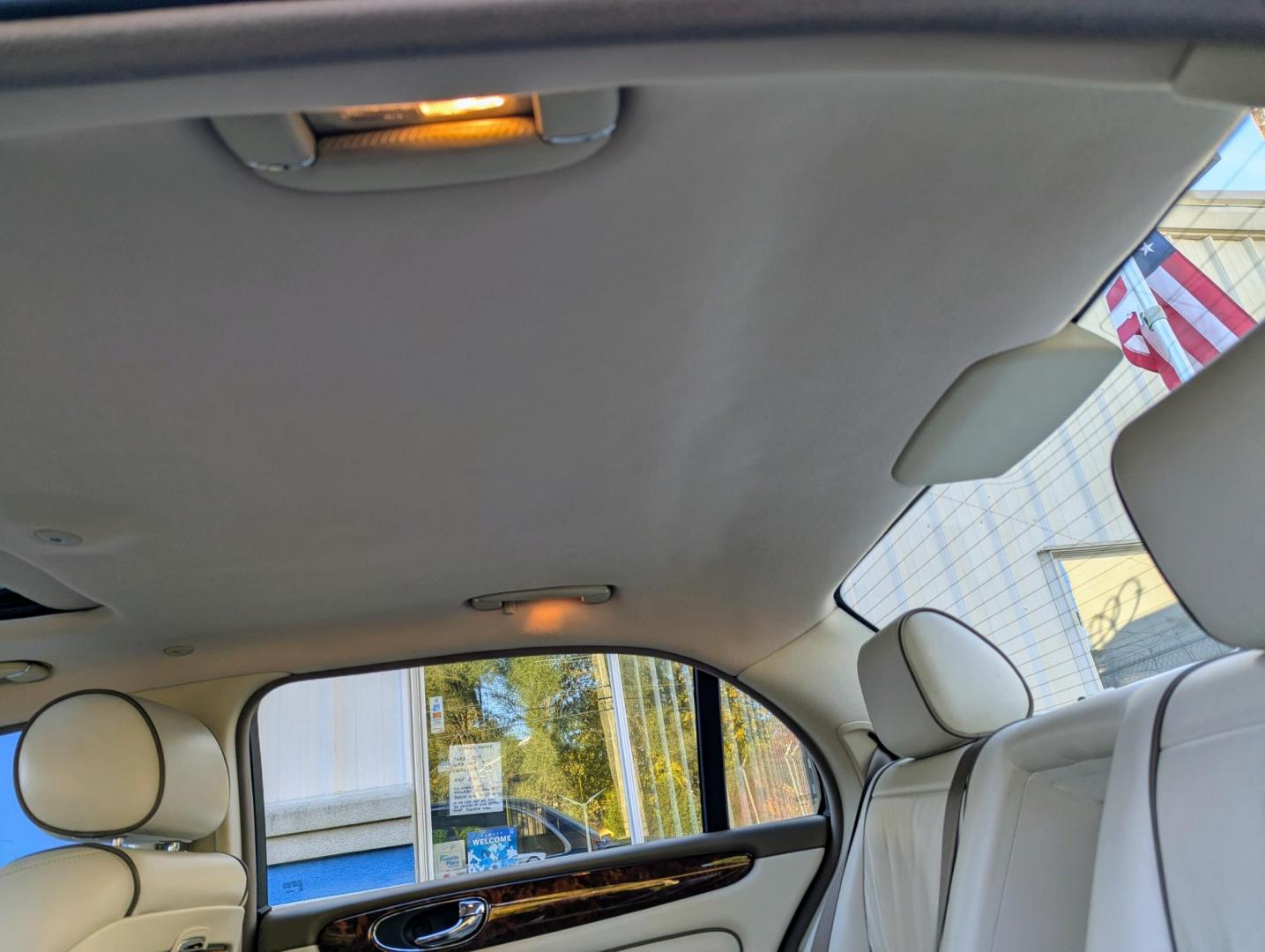 2005 Pacific Blue /Ivory Jaguar XJ-Series Vanden Plas (SAJWA82C05S) with an 4.2L V8 DOHC 32V engine, 6-Speed Automatic Overdrive transmission, located at 603 Amelia Street, Plymouth, MI, 48170, (734) 459-5520, 42.378841, -83.464546 - Vehicles shown by appointment - Please call ahead - 734-459-5520, text 734-658-4573 or contact us via our web site at: http://www.selectmotors.com for complete Inventory, Photos, Videos and FREE Carfax Reports. 2005 Jaguar XJ8 Vanden Plas, Pacific Blue with Ivory interior, one owner, 68K miles. P - Photo#7