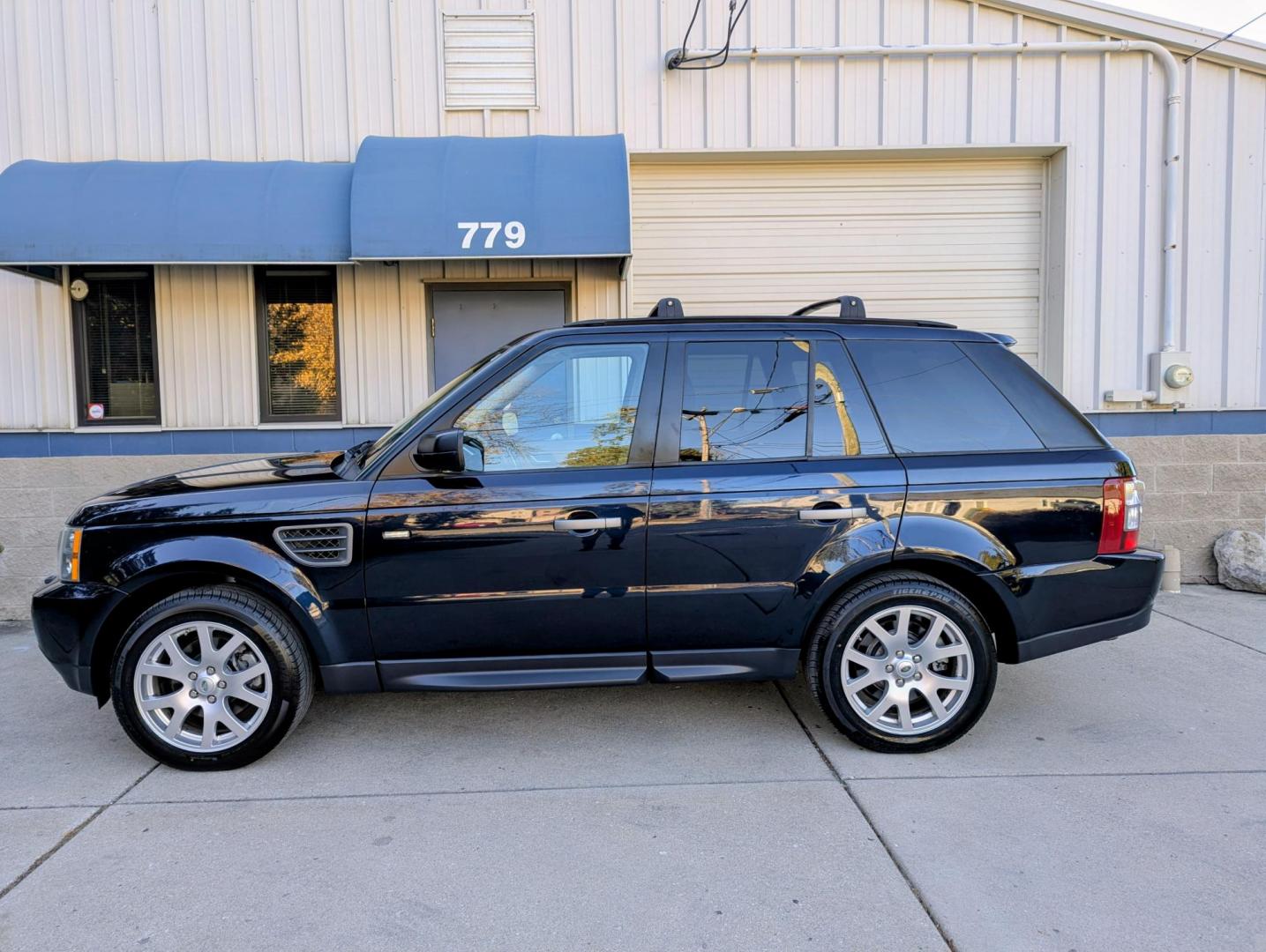 2009 Dark Blue Metallic /Almond Leather Land Rover Range Rover Sport HSE Luxury PKG (SALSK25439A) with an 4.4L V8 DOHC 32V engine, 6-Speed Automatic Overdrive transmission, located at 603 Amelia Street, Plymouth, MI, 48170, (734) 459-5520, 42.378841, -83.464546 - Vehicles shown by appointment - Please call ahead - 734-459-5520, text 734-658-4573 or contact us via our web site at: http://www.selectmotors.com for complete Inventory, Photos, Videos and FREE Carfax Reports. 2009 Land Rover Range Rover Sport, Luxury package. Dark Blue Metallic with Almond leat - Photo#1