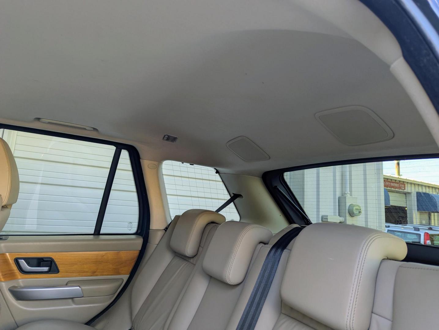 2009 Dark Blue Metallic /Almond Leather Land Rover Range Rover Sport HSE Luxury PKG (SALSK25439A) with an 4.4L V8 DOHC 32V engine, 6-Speed Automatic Overdrive transmission, located at 603 Amelia Street, Plymouth, MI, 48170, (734) 459-5520, 42.378841, -83.464546 - Vehicles shown by appointment - Please call ahead - 734-459-5520, text 734-658-4573 or contact us via our web site at: http://www.selectmotors.com for complete Inventory, Photos, Videos and FREE Carfax Reports. 2009 Land Rover Range Rover Sport, Luxury package. Dark Blue Metallic with Almond leat - Photo#7