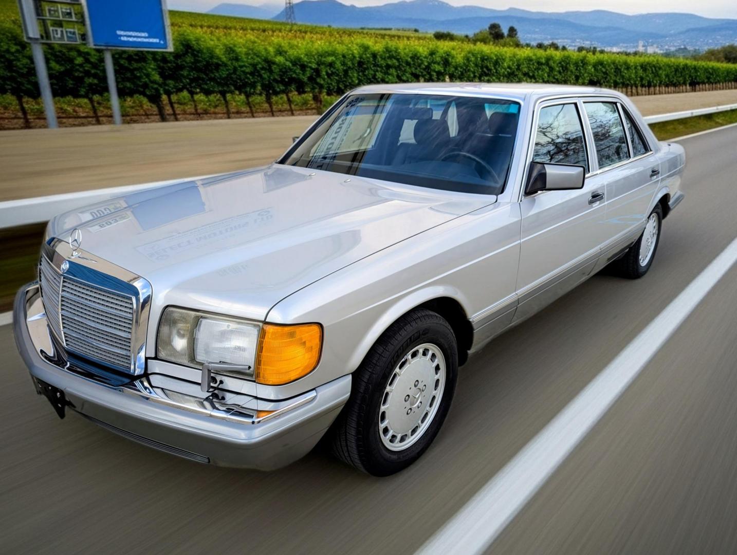 1986 Silver Metallic /Blue Leather Mercedes-Benz 420 SEL (WDBCA35DXGA) with an 4.2L V8 SOHC 16V engine, Automatic transmission, located at 603 Amelia Street, Plymouth, MI, 48170, (734) 459-5520, 42.378841, -83.464546 - Photo#23