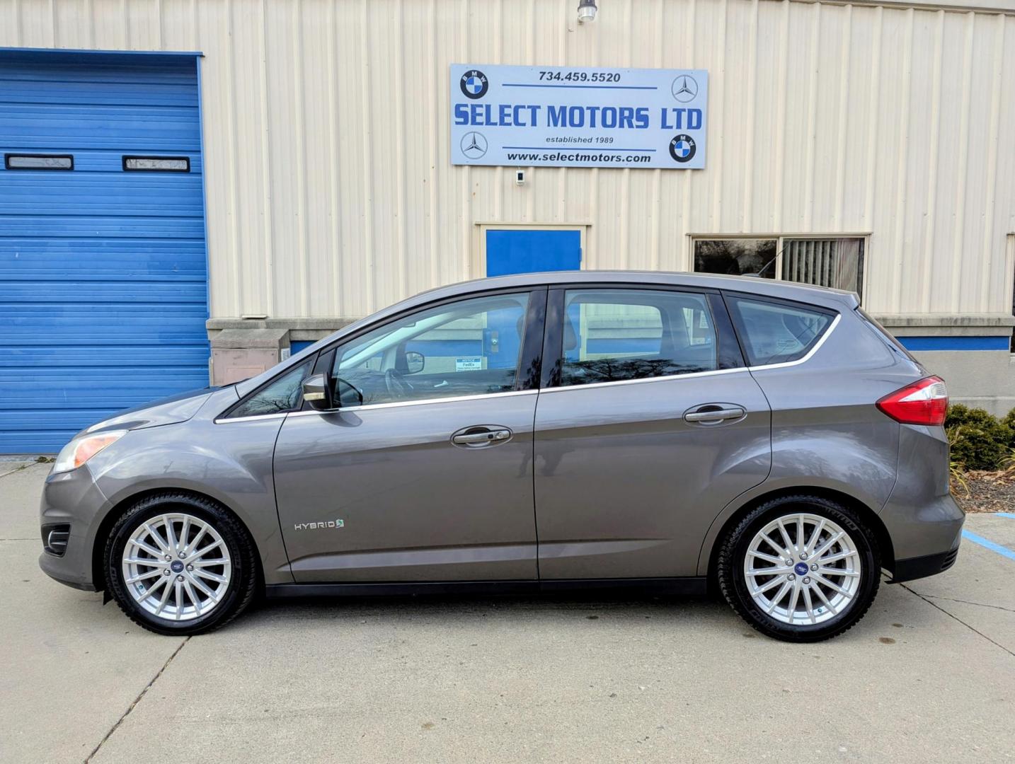 2013 Sterling Grey Metallic /Charcoal Black Leather Ford C-Max SEL (1FADP5BU3DL) with an 2.0L L4 DOHC 16V HYBRID engine, Continuously Variable Transmission transmission, located at 603 Amelia Street, Plymouth, MI, 48170, (734) 459-5520, 42.378841, -83.464546 - Photo#2
