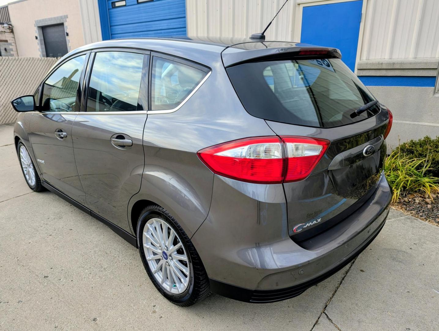 2013 Sterling Grey Metallic /Charcoal Black Leather Ford C-Max SEL (1FADP5BU3DL) with an 2.0L L4 DOHC 16V HYBRID engine, Continuously Variable Transmission transmission, located at 603 Amelia Street, Plymouth, MI, 48170, (734) 459-5520, 42.378841, -83.464546 - Photo#3