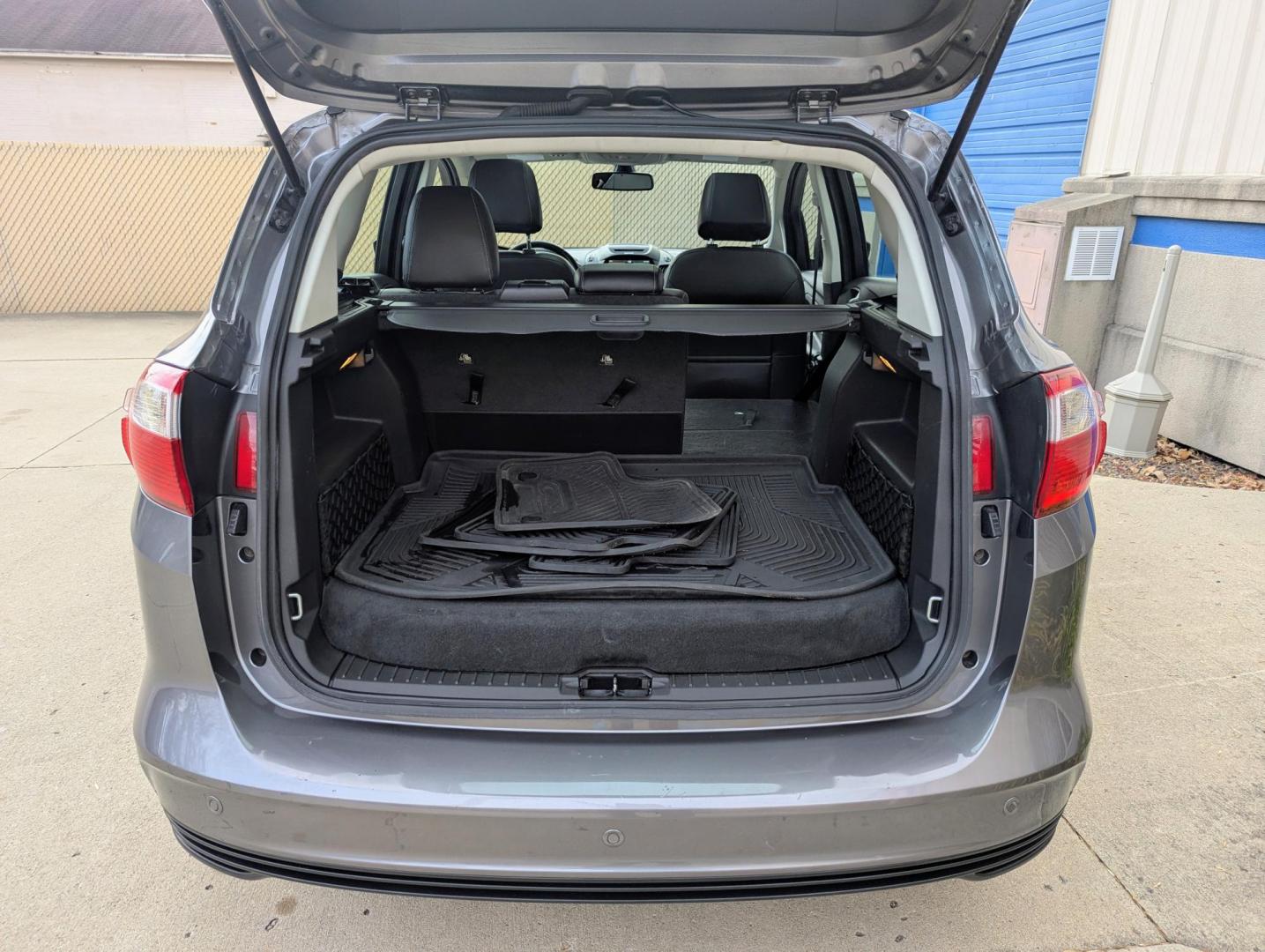 2013 Sterling Grey Metallic /Charcoal Black Leather Ford C-Max SEL (1FADP5BU3DL) with an 2.0L L4 DOHC 16V HYBRID engine, Continuously Variable Transmission transmission, located at 603 Amelia Street, Plymouth, MI, 48170, (734) 459-5520, 42.378841, -83.464546 - Photo#7