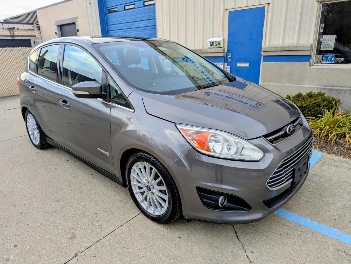 2013 Sterling Grey Metallic /Charcoal Black Leather Ford C-Max SEL (1FADP5BU3DL) with an 2.0L L4 DOHC 16V HYBRID engine, Continuously Variable Transmission transmission, located at 603 Amelia Street, Plymouth, MI, 48170, (734) 459-5520, 42.378841, -83.464546 - Photo#11