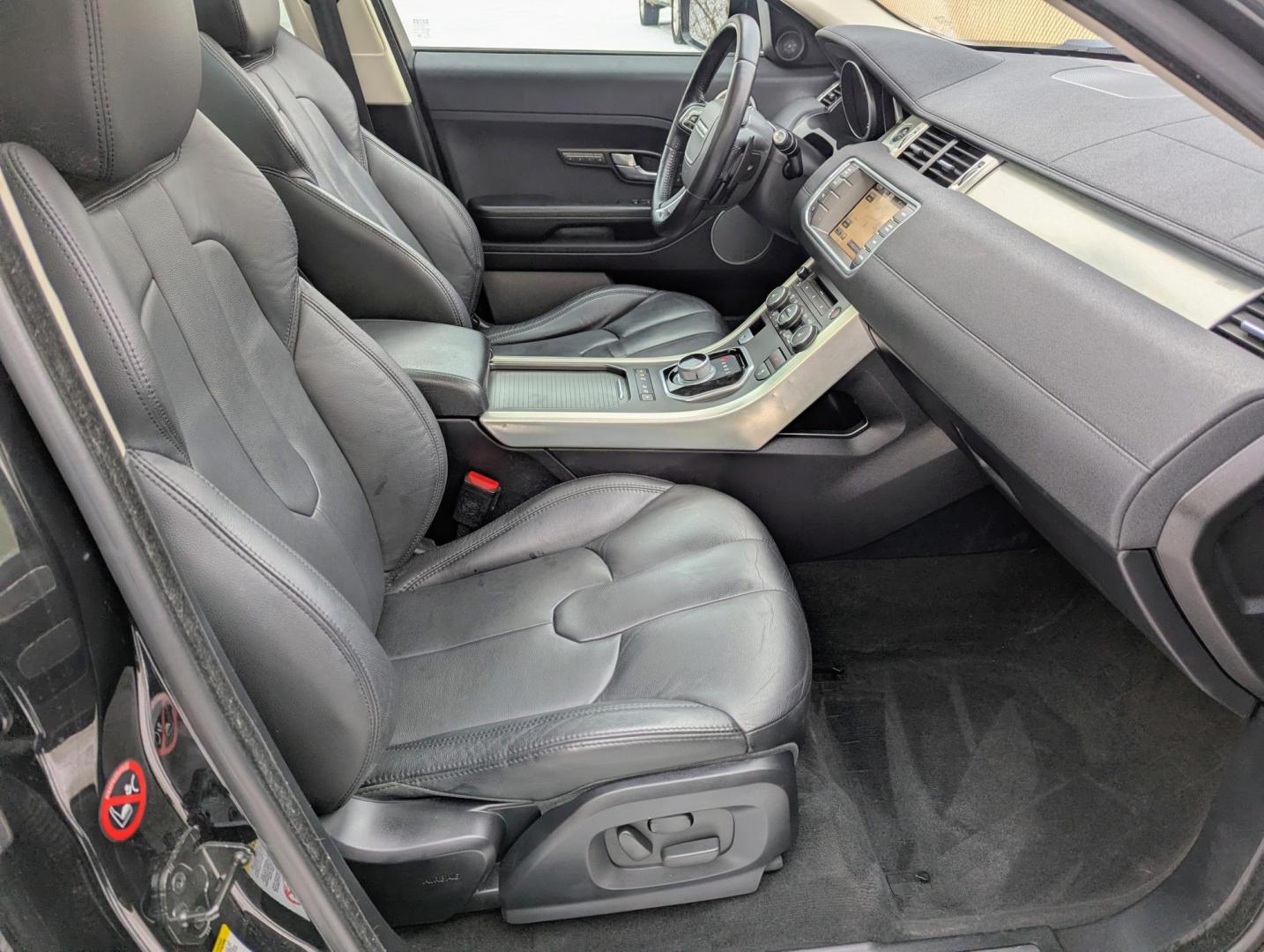 2013 Black /Ebony Leather Land Rover Range Rover Evoque Pure Premium 5-Door (SALVR2BG9DH) with an 2.0L L4 DOHC 24V TURBO engine, 6-Speed Automatic transmission, located at 603 Amelia Street, Plymouth, MI, 48170, (734) 459-5520, 42.378841, -83.464546 - Vehicles shown by appointment - Please call ahead - 734-459-5520, text 734-658-4573 or contact us via our web site at: http://www.selectmotors.com for complete Inventory, Photos, Videos and FREE Carfax Reports. 2013 Land Rover Range Rover Evoque Pure Premium, Santorini Black Metallic, Ebony lea - Photo#7