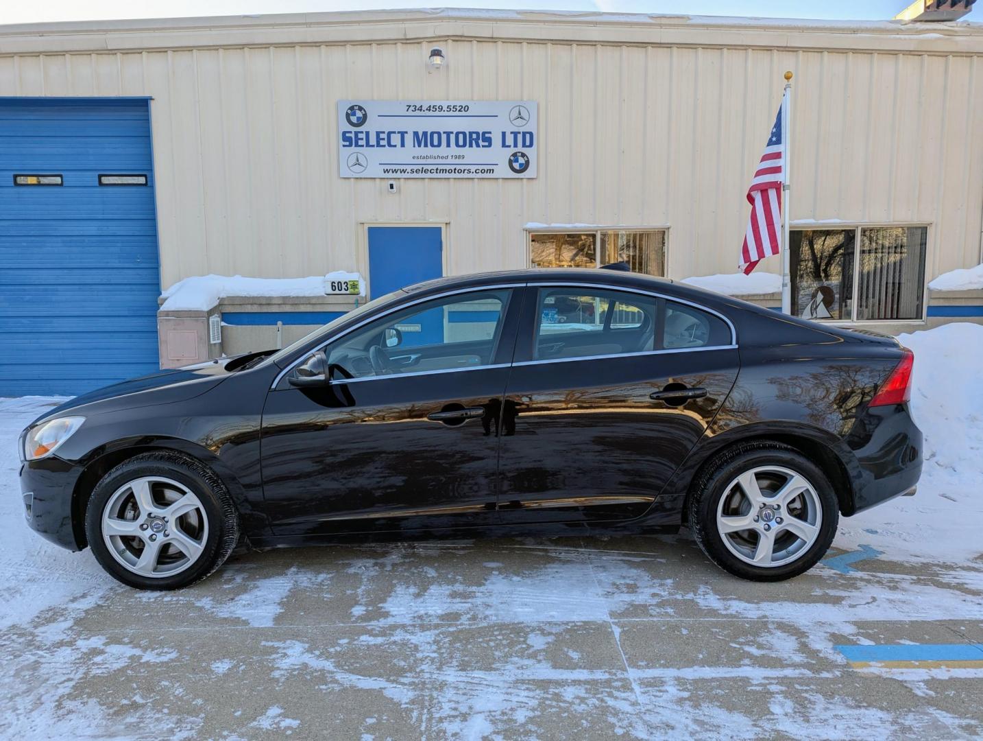 2013 Black /Beige Leather Volvo S60 T5 (YV1612FS7D2) with an 2.5L L5 DOHC 20V TURBO engine, 6-Speed Automatic transmission, located at 603 Amelia Street, Plymouth, MI, 48170, (734) 459-5520, 42.378841, -83.464546 - Vehicles shown by appointment - Please call ahead - 734-459-5520, text 734-658-4573 or contact us via our web site at: http://www.selectmotors.com for complete Inventory, Photos, Videos and FREE Carfax Reports. 2013 Volvo S60 T5 Premier, Ember Black Metallic/Beige leather with black carpets and - Photo#2