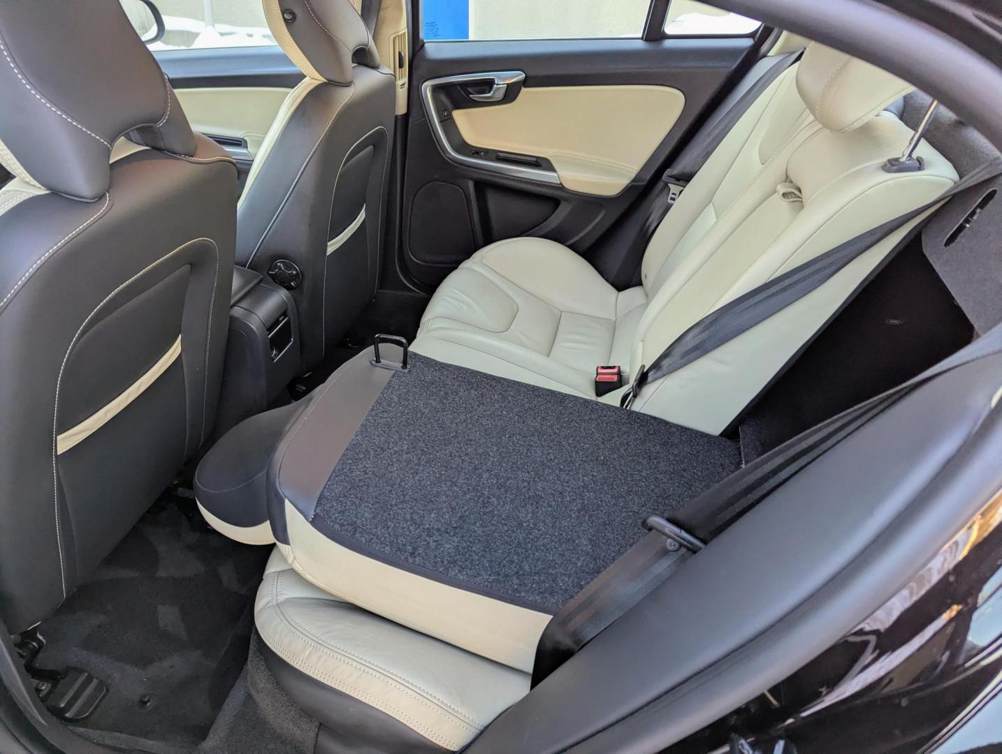 2013 Black /Beige Leather Volvo S60 T5 (YV1612FS7D2) with an 2.5L L5 DOHC 20V TURBO engine, 6-Speed Automatic transmission, located at 603 Amelia Street, Plymouth, MI, 48170, (734) 459-5520, 42.378841, -83.464546 - Vehicles shown by appointment - Please call ahead - 734-459-5520, text 734-658-4573 or contact us via our web site at: http://www.selectmotors.com for complete Inventory, Photos, Videos and FREE Carfax Reports. 2013 Volvo S60 T5 Premier, Ember Black Metallic/Beige leather with black carpets and - Photo#6