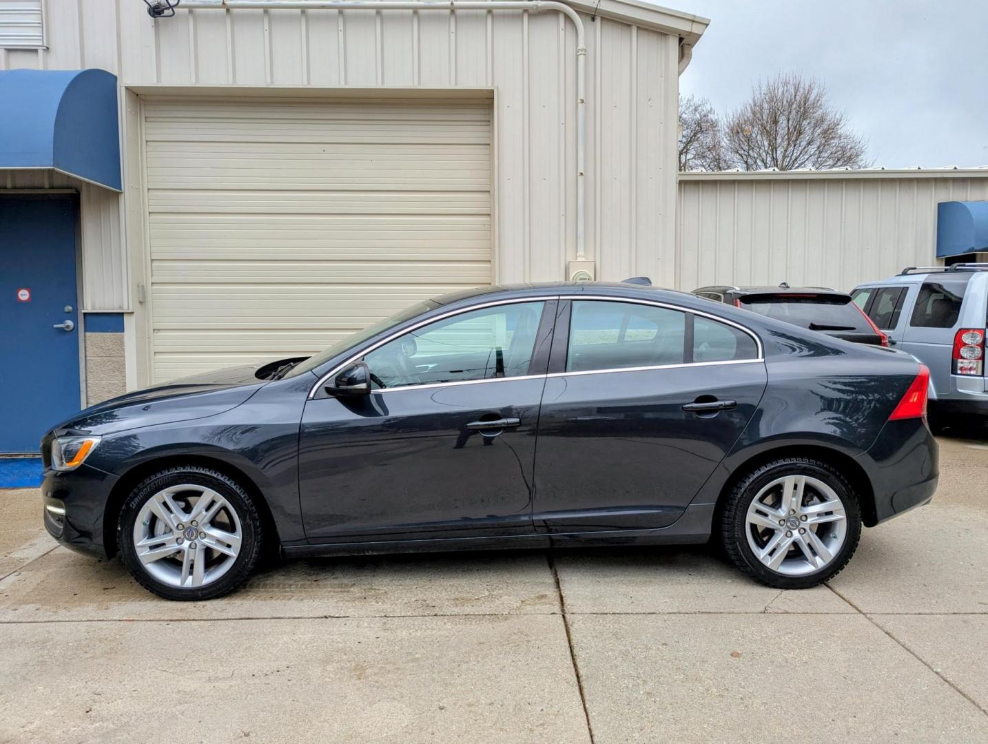 2015 Saville Grey Metallic /Black Leather Volvo S60 2.5 Platinum 4WD (YV1612TM3F1) with an 2.5L L5 DOHC 20V engine, 6-Speed Automatic transmission, located at 603 Amelia Street, Plymouth, MI, 48170, (734) 459-5520, 42.378841, -83.464546 - Vehicles shown by appointment - Please call ahead - 734-459-5520, text 734-658-4573 or contact us via our web site at: http://www.selectmotors.com for complete Inventory, Photos, Videos and FREE Carfax Reports. Rare Find: 2015.5 Volvo S60 T5 AWD Platinum Edition Pristine Condition | One Owner | L- Photo#1