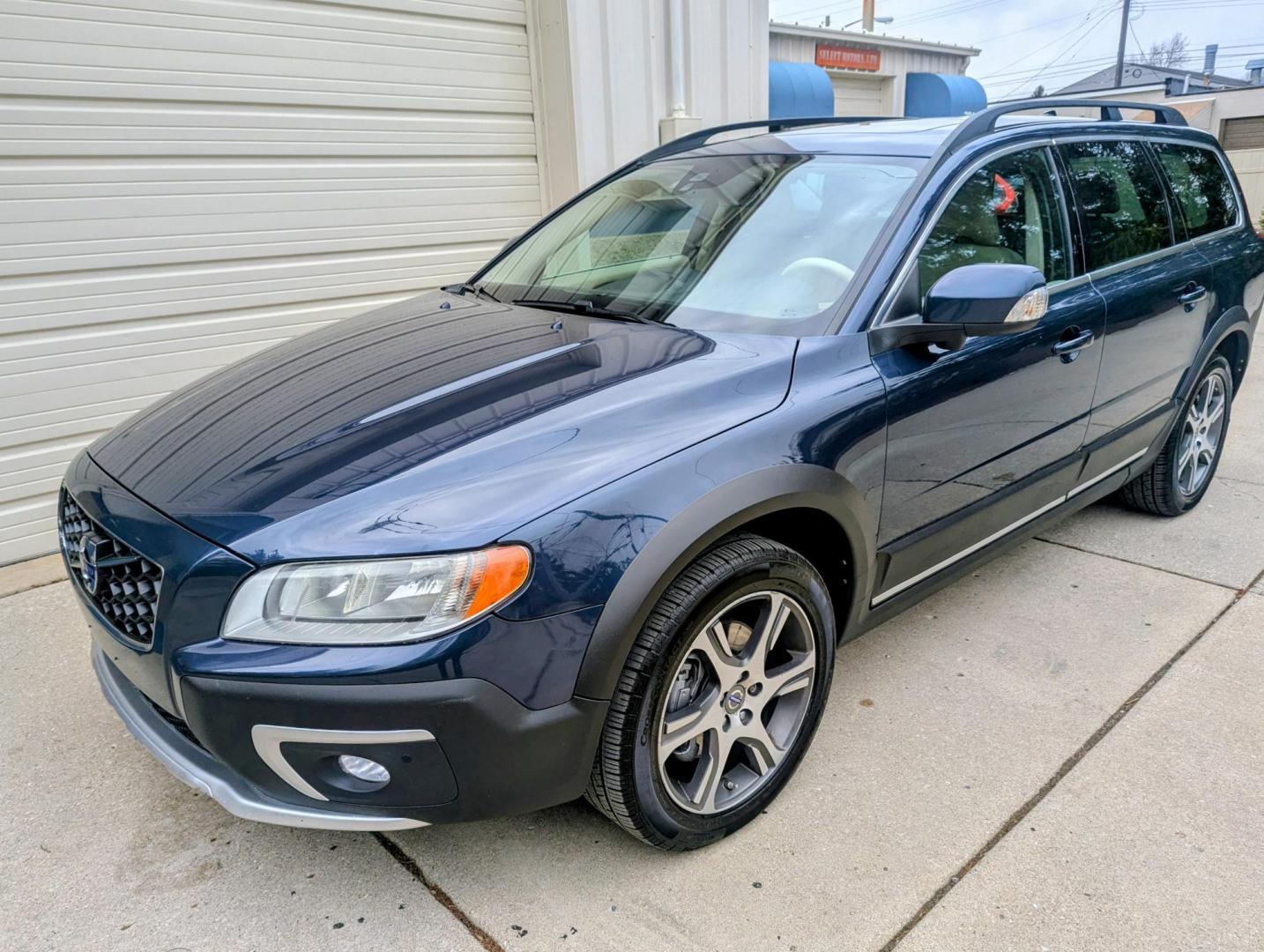 2015 Caspian Blue Metallic /Beige Volvo XC70 3.0 Platinum 4WD (YV4902ND4F1) with an 3.0L L6 DOHC 24V TURBO engine, 6-Speed Automatic transmission, located at 603 Amelia Street, Plymouth, MI, 48170, (734) 459-5520, 42.378841, -83.464546 - Vehicles shown by appointment - Please call ahead - 734-459-5520, text 734-658-4573 or contact us via our web site at: http://www.selectmotors.com for complete Inventory, Photos, Videos and FREE Carfax Reports. 2015 Volvo XC70 T6 Platinum – The Ultimate All-Weather Wagon Looking for the perfec - Photo#0