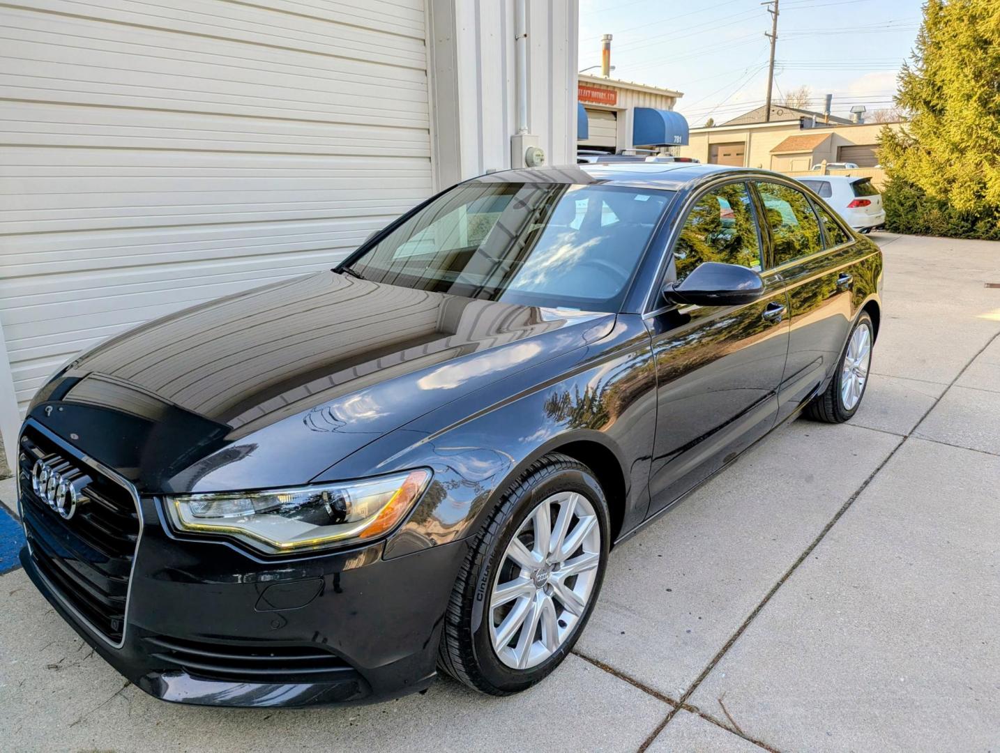2014 Black /Brown Leather Audi A6 2.0T Premium Sedan FrontTrak Multitronic (WAUGFAFC5EN) with an 2.0L L4 DOHC 16V engine, CVT transmission, located at 603 Amelia Street, Plymouth, MI, 48170, (734) 459-5520, 42.378841, -83.464546 - Vehicles shown by appointment - Please call ahead - 734-459-5520, text 734-658-4573 or contact us via our web site at: http://www.selectmotors.com for complete Inventory, Photos, Videos and FREE Carfax Reports. 2014 Audi A6 2.0T Quattro Premium Plus Price: $11,995 Experience the perfect blend - Photo#0