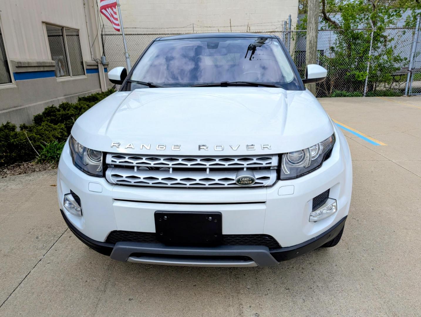 2015 White /Tan/Ivory/Espresso Land Rover Range Rover Evoque Prestige Premium 5-Door (SALVV2BG5FH) with an 2.0L L4 DOHC 24V TURBO engine, 9-Speed Automatic transmission, located at 603 Amelia Street, Plymouth, MI, 48170, (734) 459-5520, 42.378841, -83.464546 - Photo#1