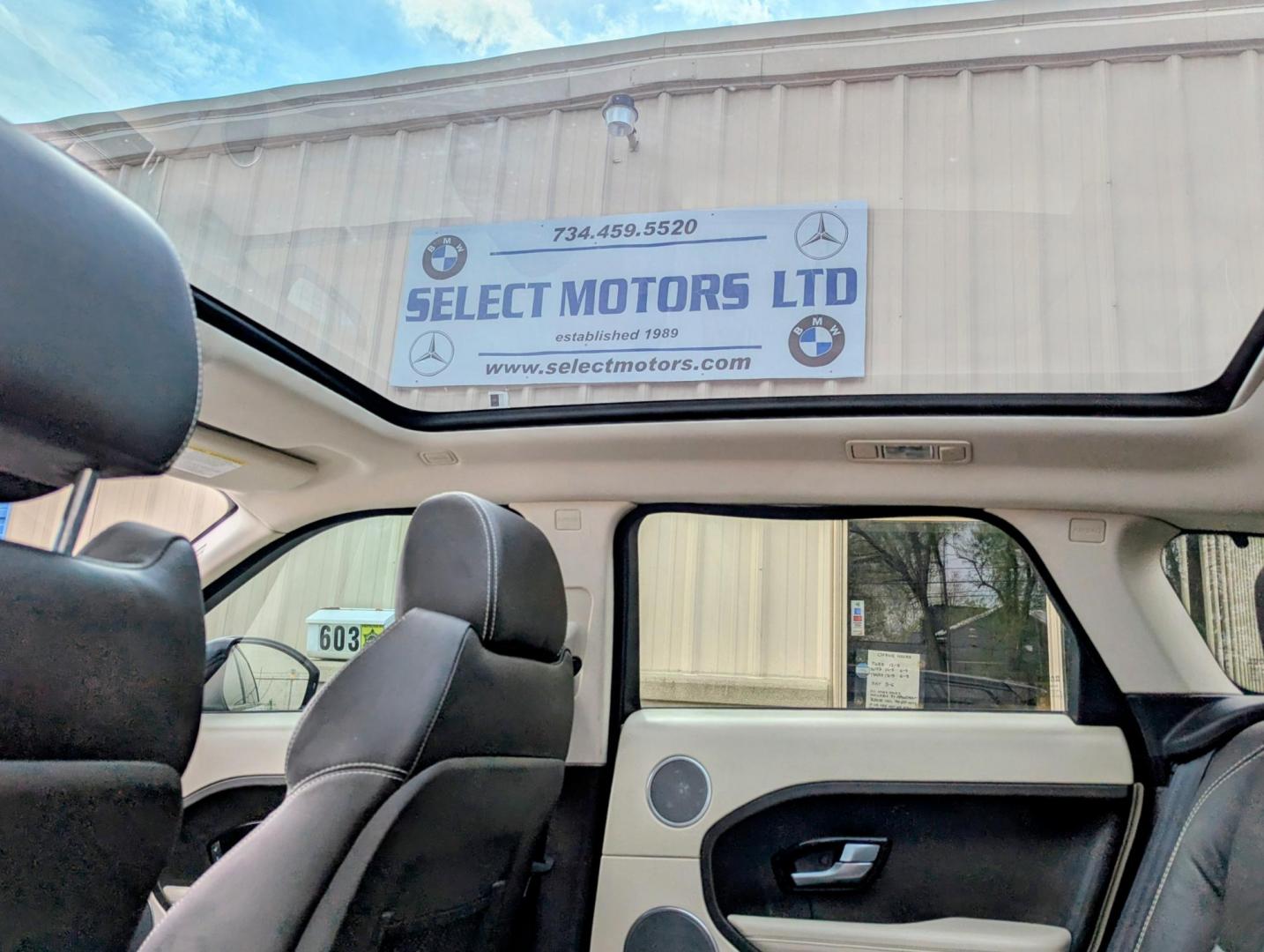 2015 White /Tan/Ivory/Espresso Land Rover Range Rover Evoque Prestige Premium 5-Door (SALVV2BG5FH) with an 2.0L L4 DOHC 24V TURBO engine, 9-Speed Automatic transmission, located at 603 Amelia Street, Plymouth, MI, 48170, (734) 459-5520, 42.378841, -83.464546 - Photo#6